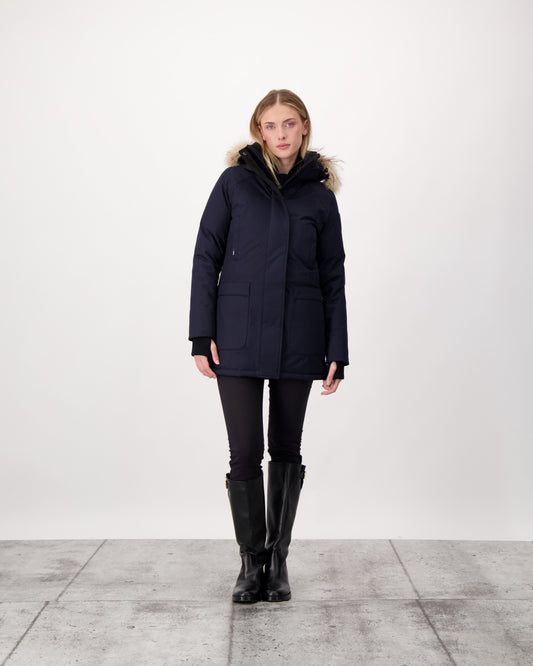 Women's down filled parka that sits just below the hip with a clean look and two hip patch pockets in Navy