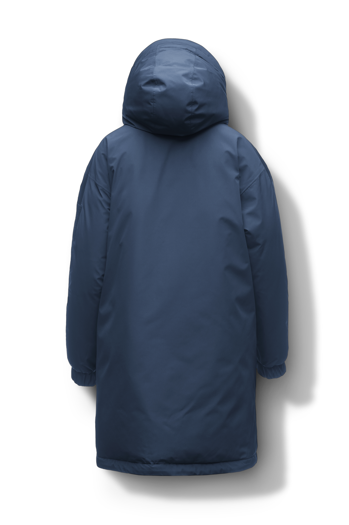 Slyn Women's Performance Parka in thigh length, premium 3-ply micro denier and cire technical nylon taffeta fabrication, Premium Canadian origin White Duck Down insulation, non-removable down-filled hood, inner hooded gilet, two-way centre-front zipper with magnetic closure wind flap, fleece-lined pockets at chest and waist, pit zipper vents, in Marine