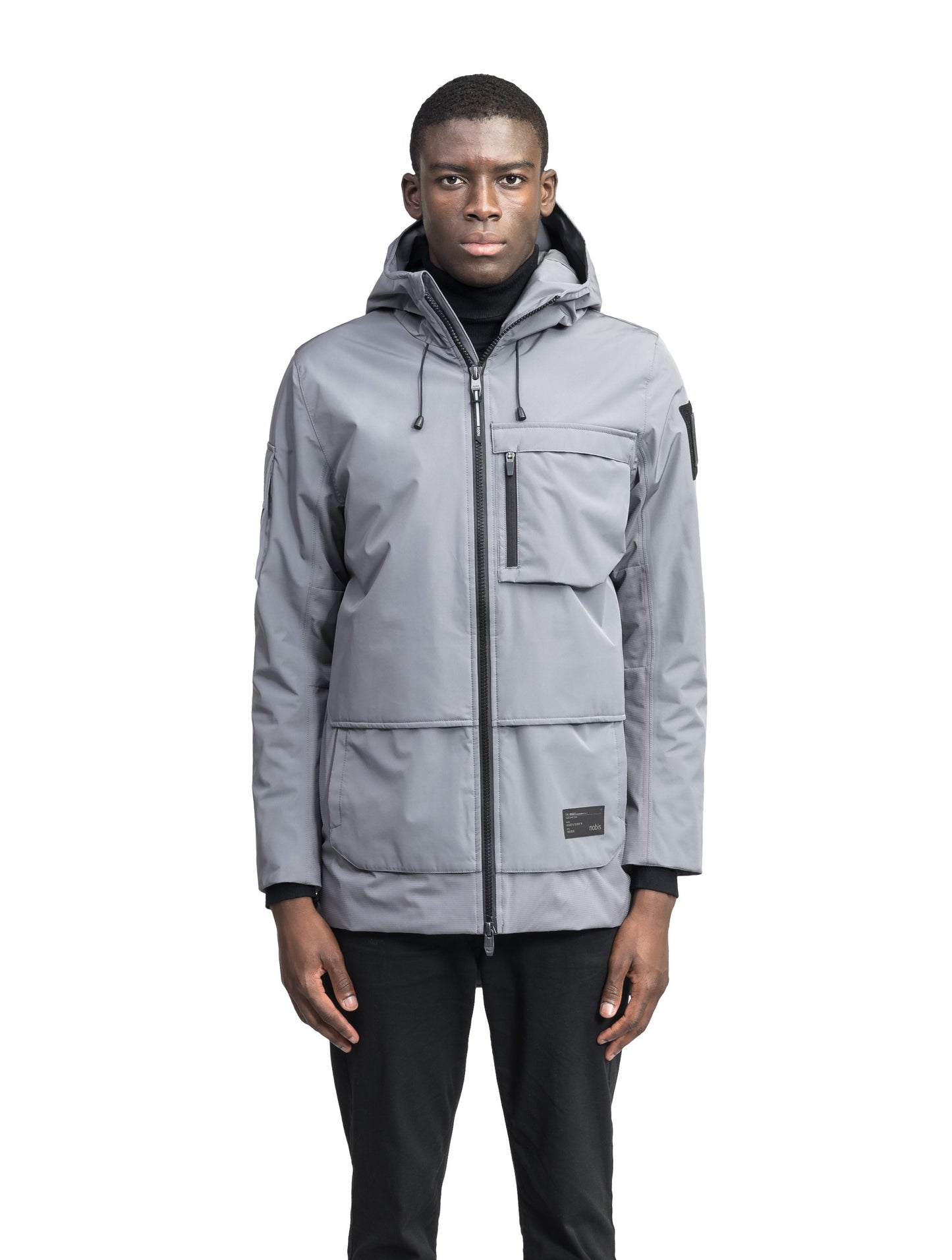 Alta Men's Performance Shell Jacket in hip length, Primaloft Gold Insulation Active+, chest and waist pockets, ventilation under arms, reflective detailing on hood and back, two-way front zipper, and non-removable hood with adjustable drawstrings, in Concrete