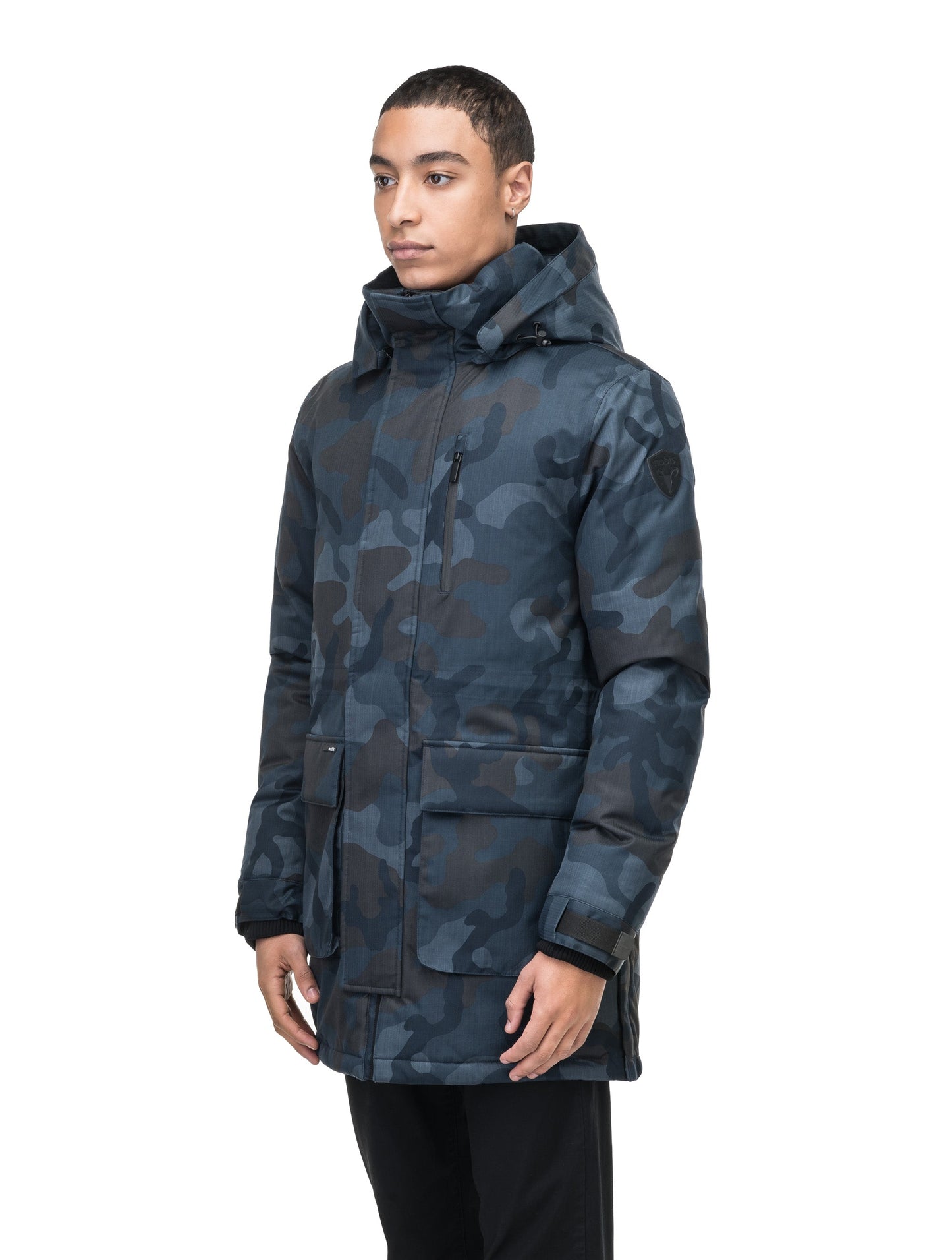 Mid weight men's down filled parka with two patch pockets at the hip and snap closure side vents in Navy Camo