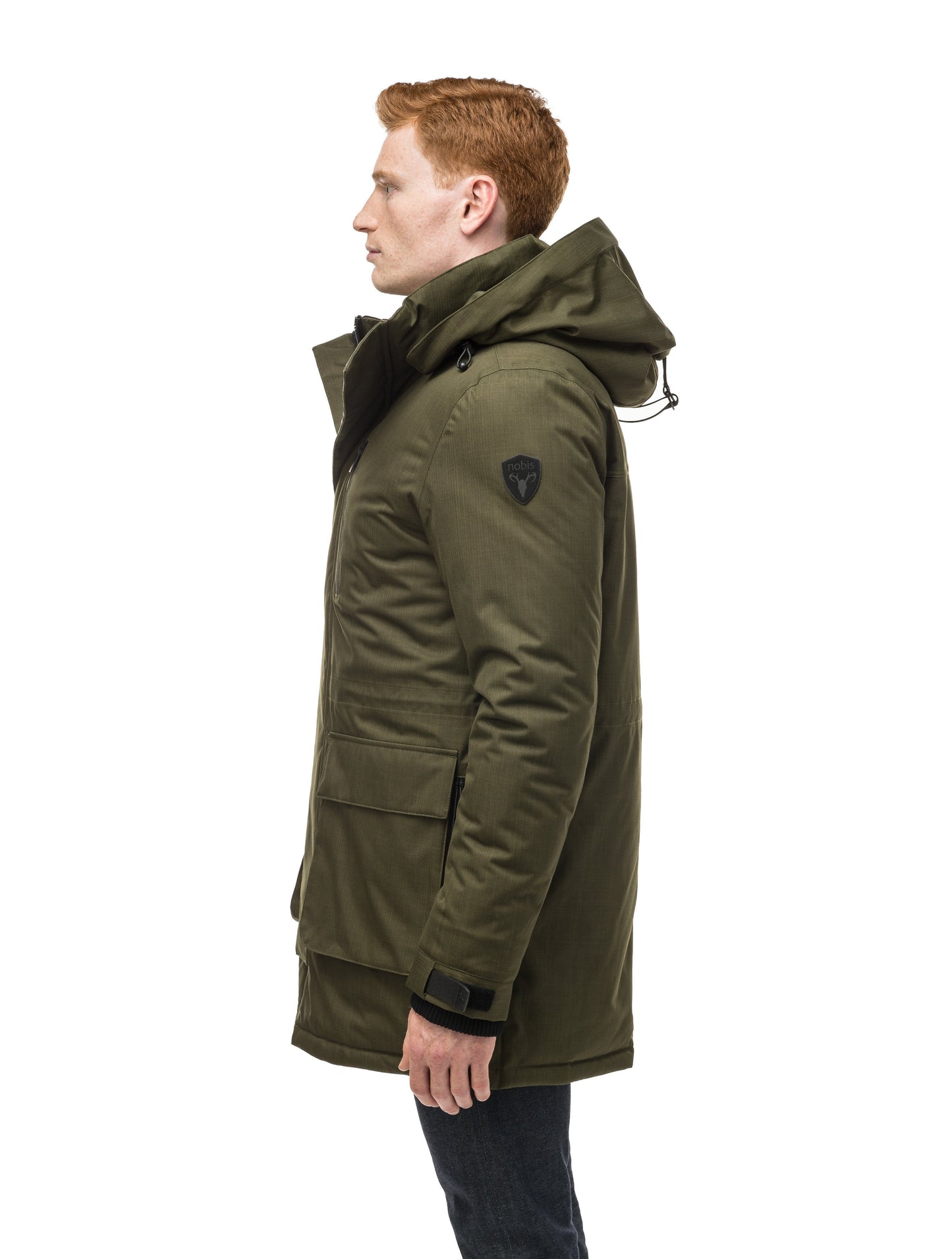 Mid weight men's down filled parka with two patch pockets at the hip and snap closure side vents in Fatigue