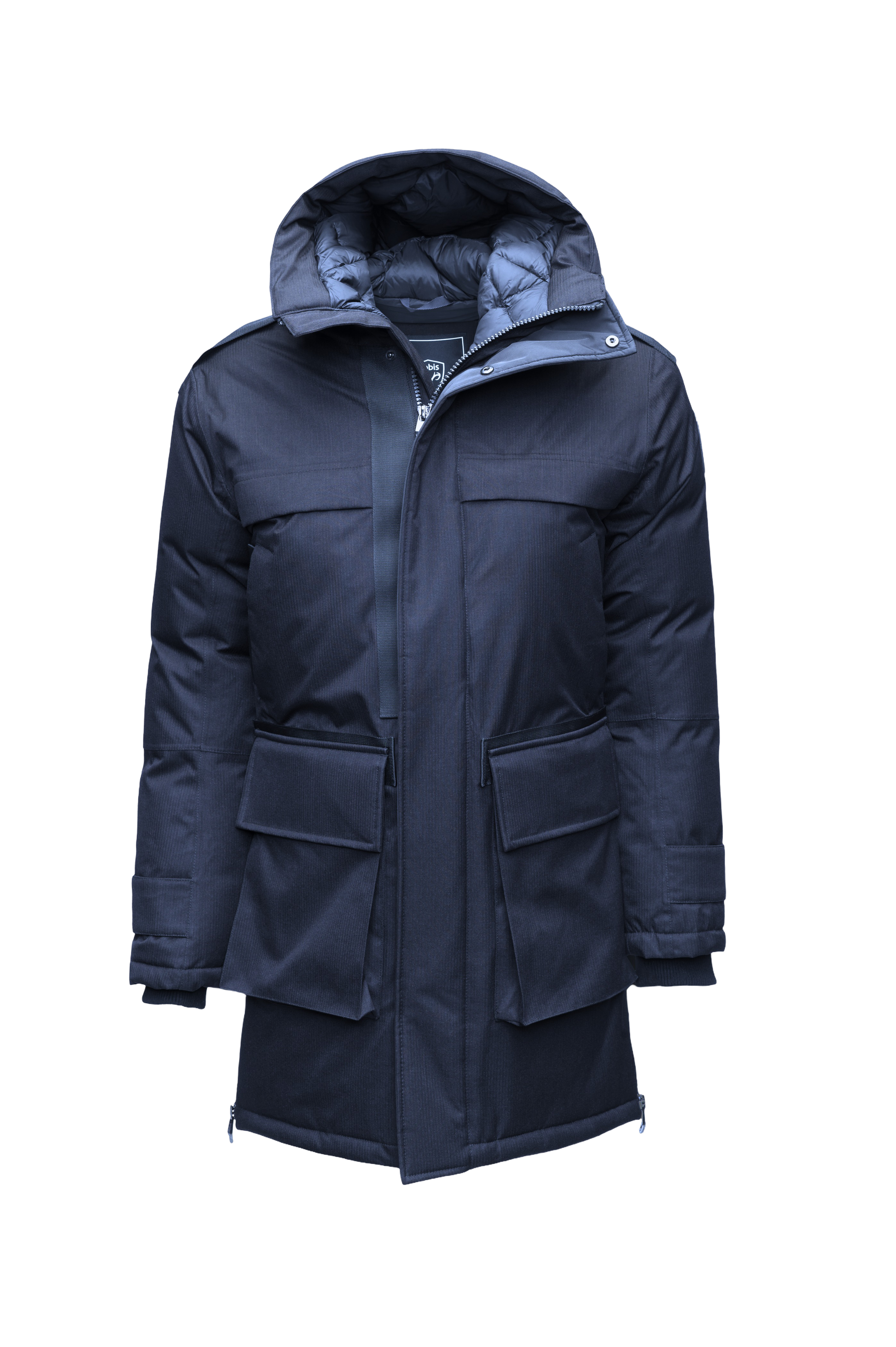 Alum Men's Long Parka in thigh length, Premium Canadian White Duck Down insulation, non-removable hood with removable coyote fur trim, two-way centre front zipper with magnetic closure wind flap, four exterior patch pockets at front, in Navy