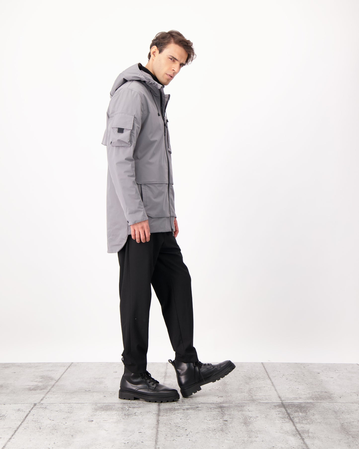 Alta Men's Performance Shell Jacket in hip length, Primaloft Gold Insulation Active+, chest and waist pockets, ventilation under arms, reflective detailing on hood and back, two-way front zipper, and non-removable hood with adjustable drawstrings, in Concrete