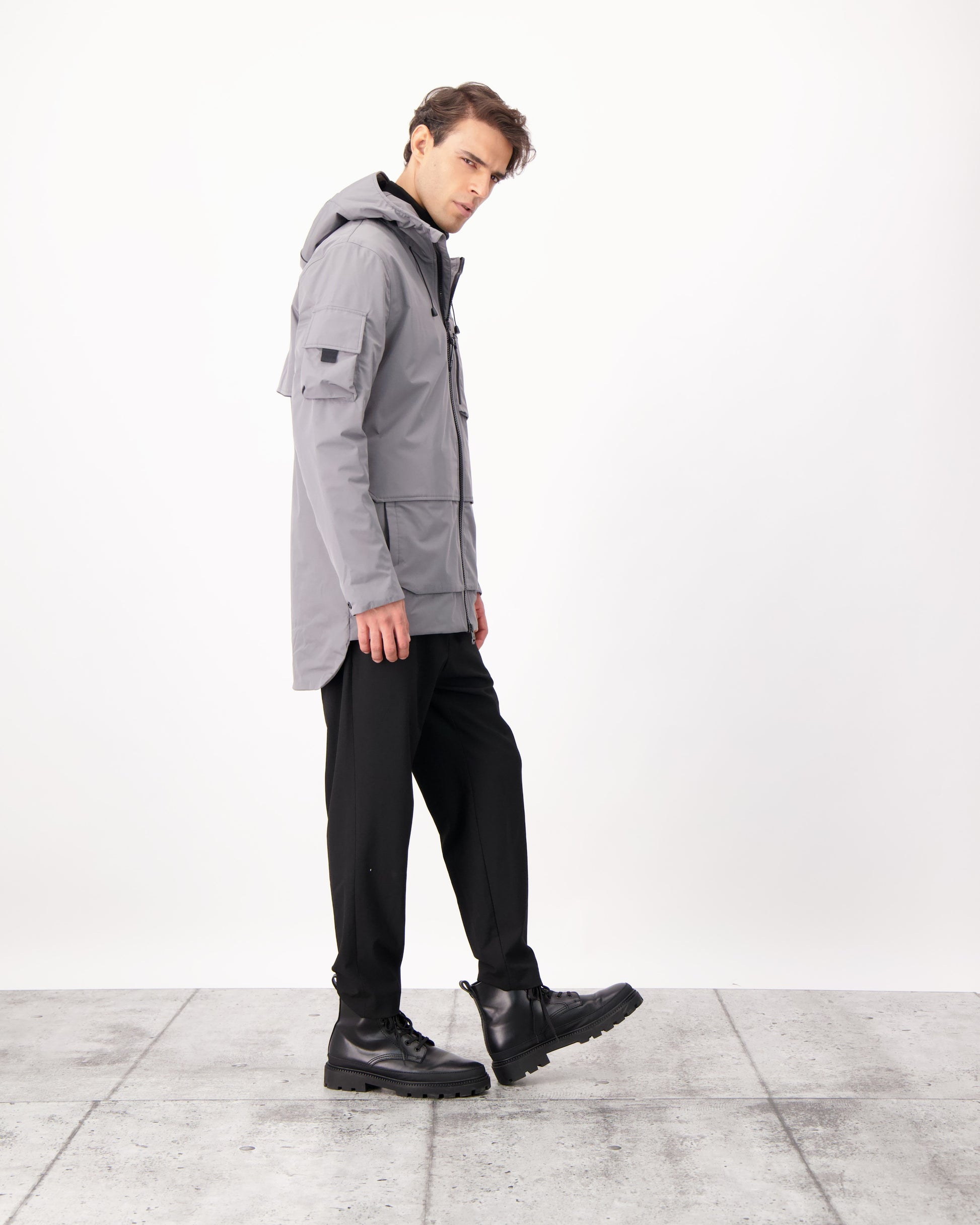 Alta Men's Performance Shell Jacket in hip length, Primaloft Gold Insulation Active+, chest and waist pockets, ventilation under arms, reflective detailing on hood and back, two-way front zipper, and non-removable hood with adjustable drawstrings, in Concrete