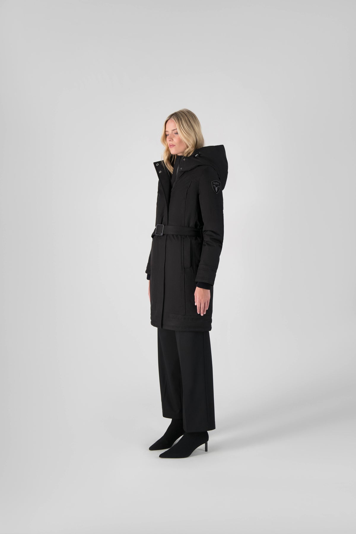 Women's Thigh length own parka with a furless oversized hood in Black