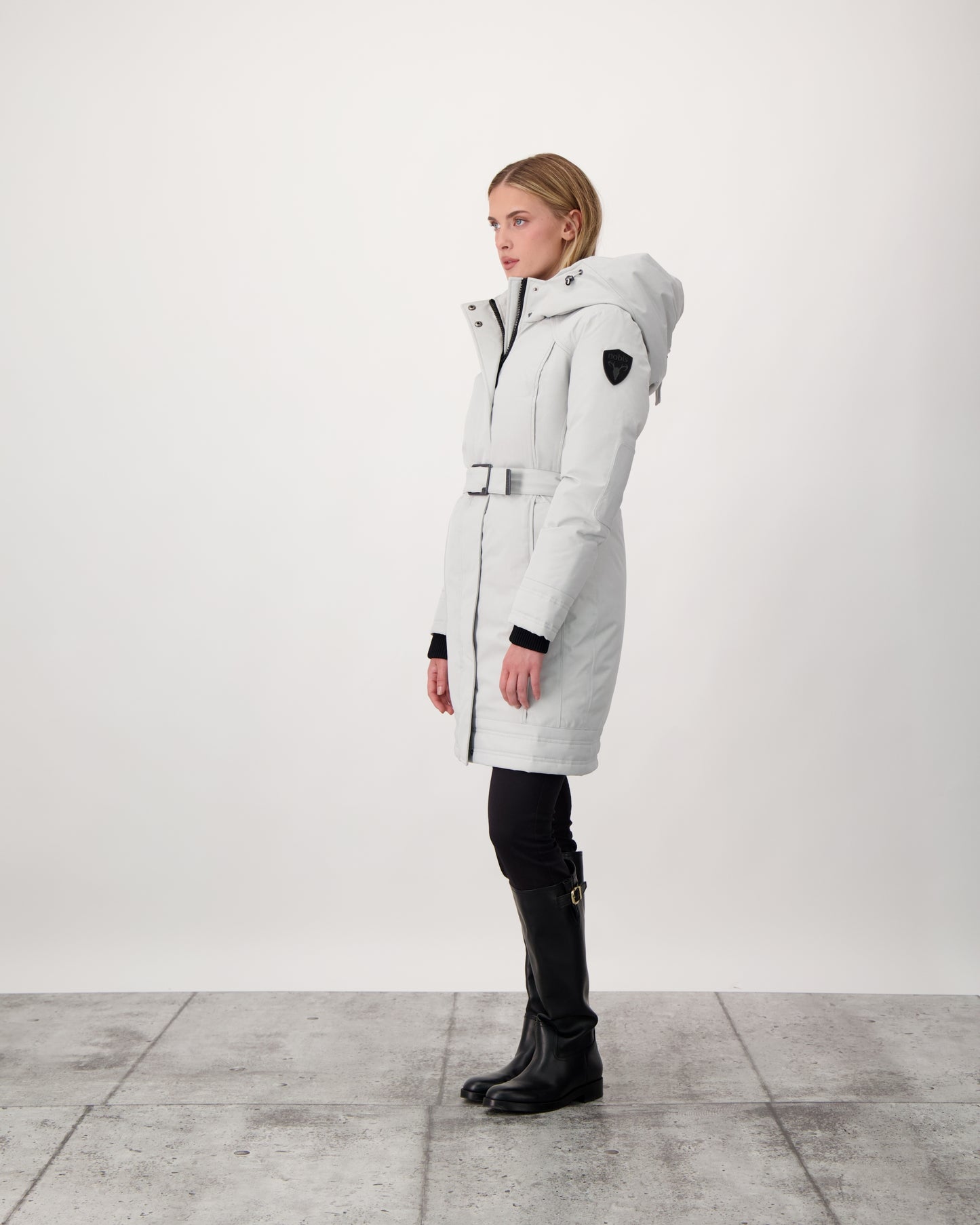 Women's Thigh length own parka with a furless oversized hood in CH Light Grey