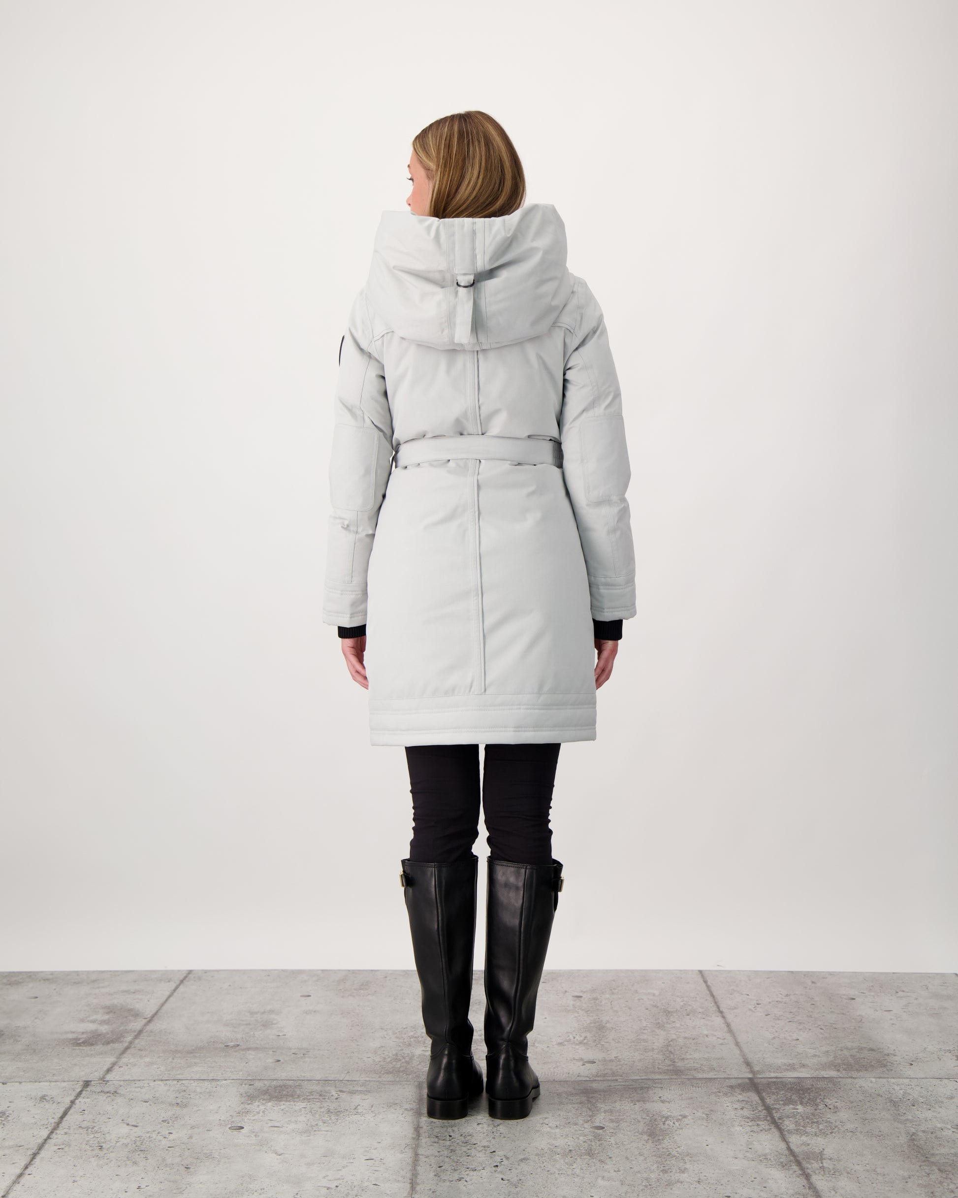 Women's Thigh length own parka with a furless oversized hood in CH Light Grey