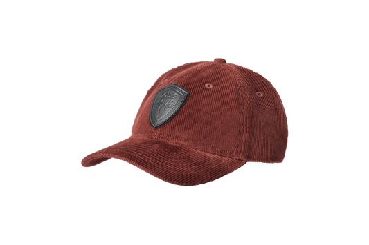 Carter Unisex Tailored Ball Cap in 100% cotton corduroy, unstructured crown, curved brim, and leather strap back with metal buckle closure, in Rio Red + Rio Red