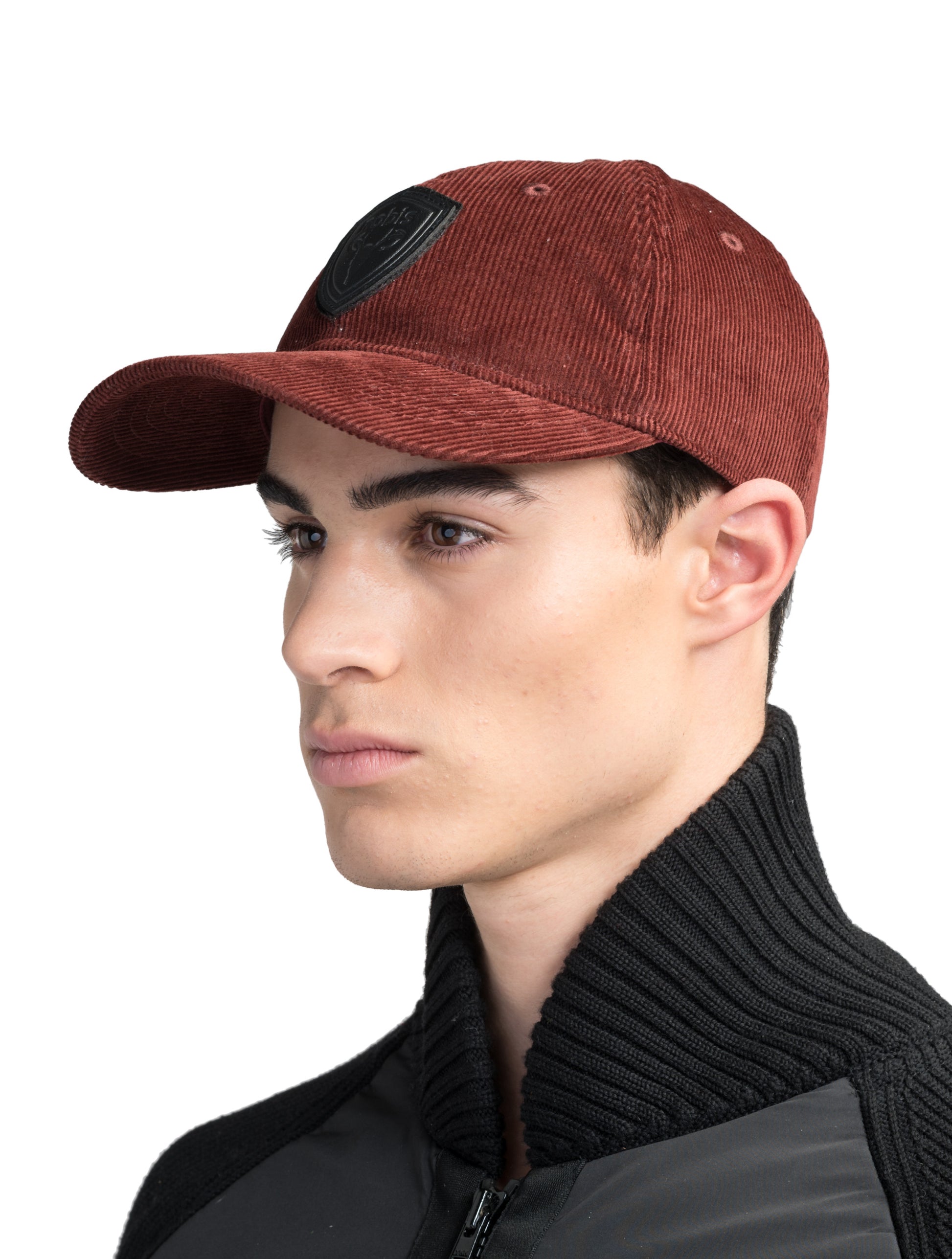 Carter Unisex Tailored Ball Cap in 100% cotton corduroy, unstructured crown, curved brim, and leather strap back with metal buckle closure, in Rio Red