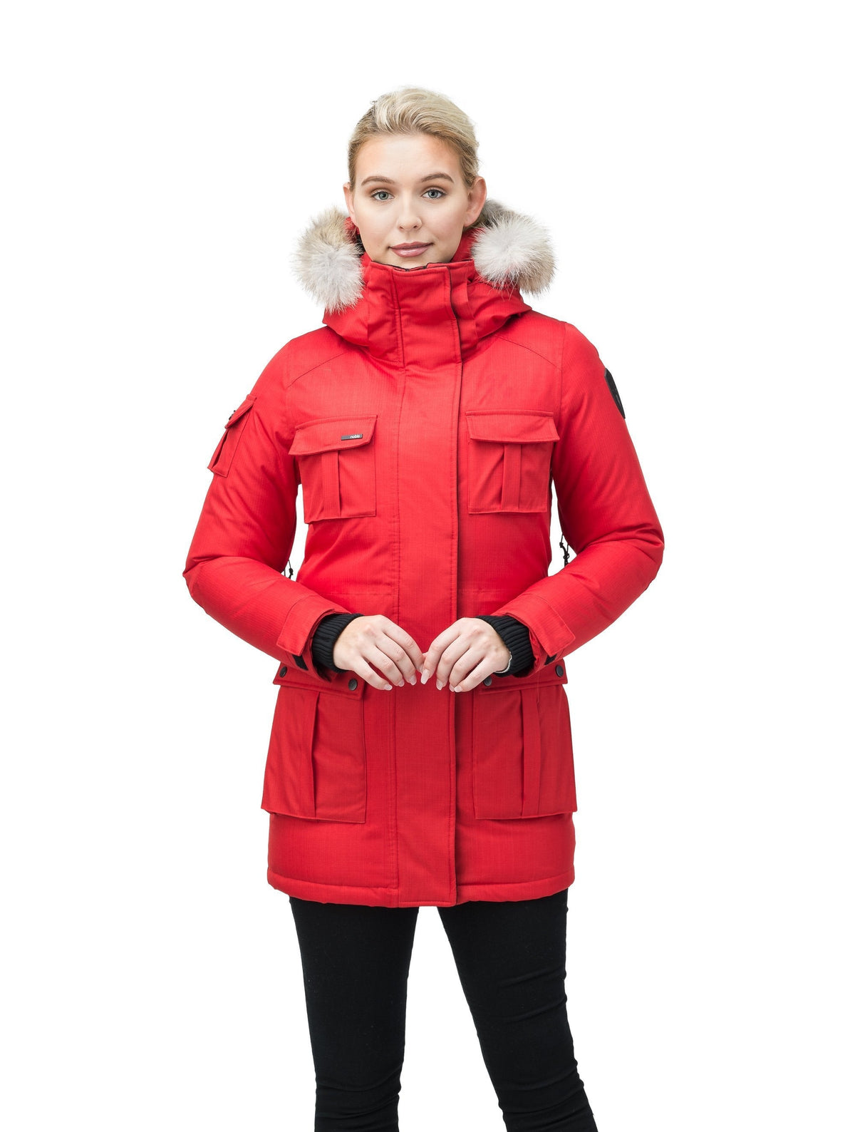 Women's down filled thigh length parka with four pleated patch pockets and an adjustable waist in Red