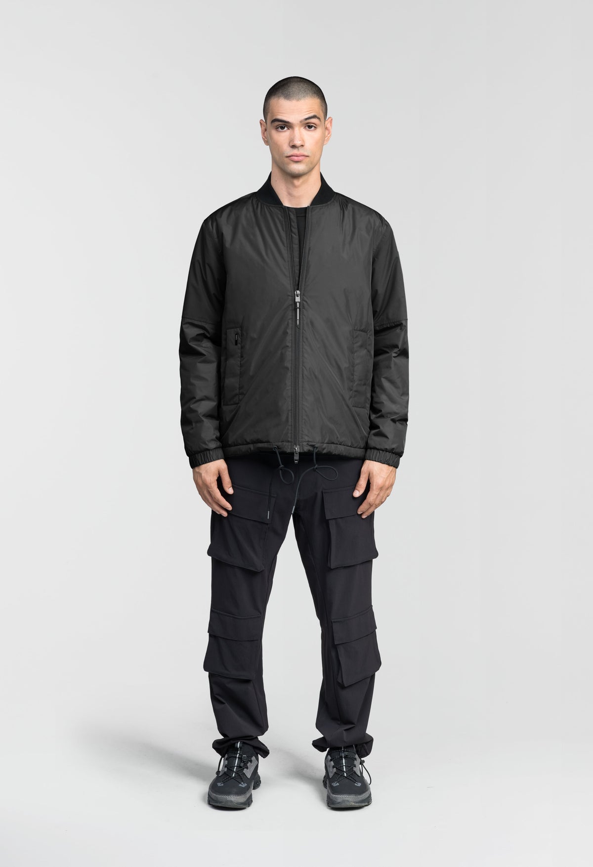 Edgemont Men's Tailored Coach Jacket in hip length, rib knit collar, elastic cuffs, centre front two-wau zipper, single welt waist pockets, adjustable waist drawstring, in Black