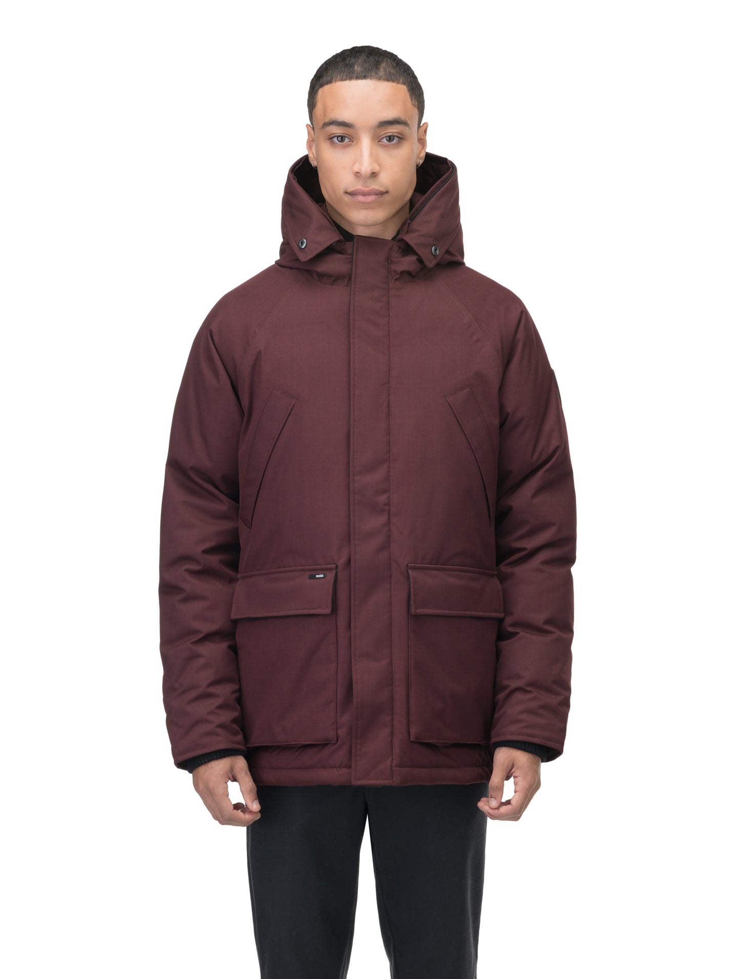 Heritage Furless Men's Parka in hip length, Canadian white duck down insulation, non-removable hood, front zipper with magnetic placket, chest hand warmer pockets, waist flap pockets, and elastic cuffs, in Merlot