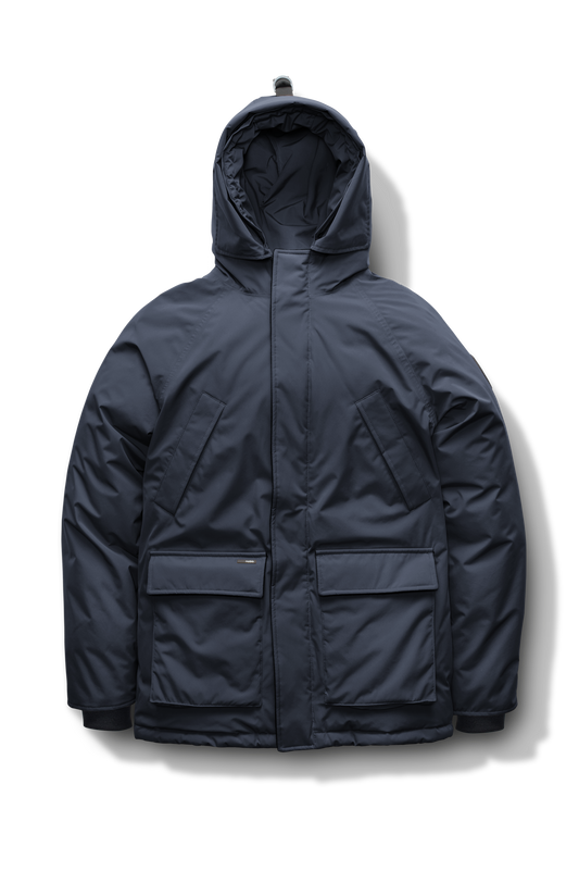 Heritage Furless Men's Parka in hip length, Canadian white duck down insulation, non-removable hood, front zipper with magnetic placket, chest hand warmer pockets, waist flap pockets, and elastic cuffs, in Navy + Navy
