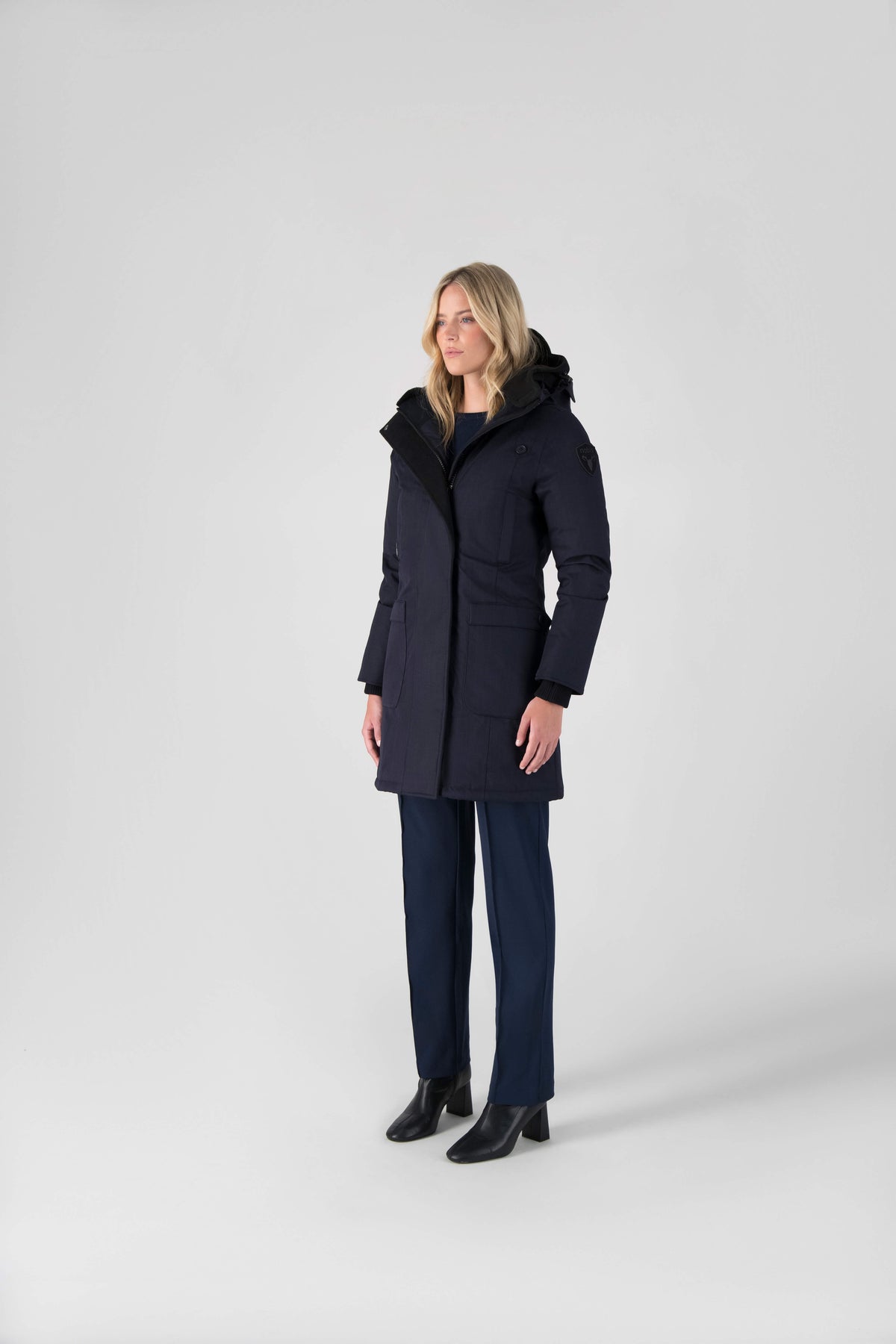 Best selling women's down filled knee length parka with removable down filled hood in Navy