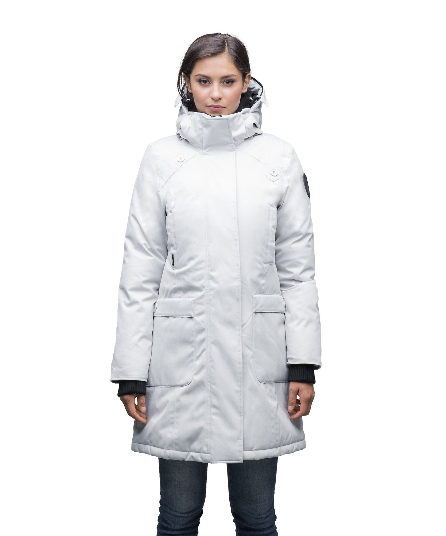 Merideth Furless Ladies Parka in thigh length, Canadian white duck down insulation, removable down-filled hood, centre-front two-way zipper with magnetic wind flap closure, four exterior pockets, and elastic ribbed cuffs, in Light Grey