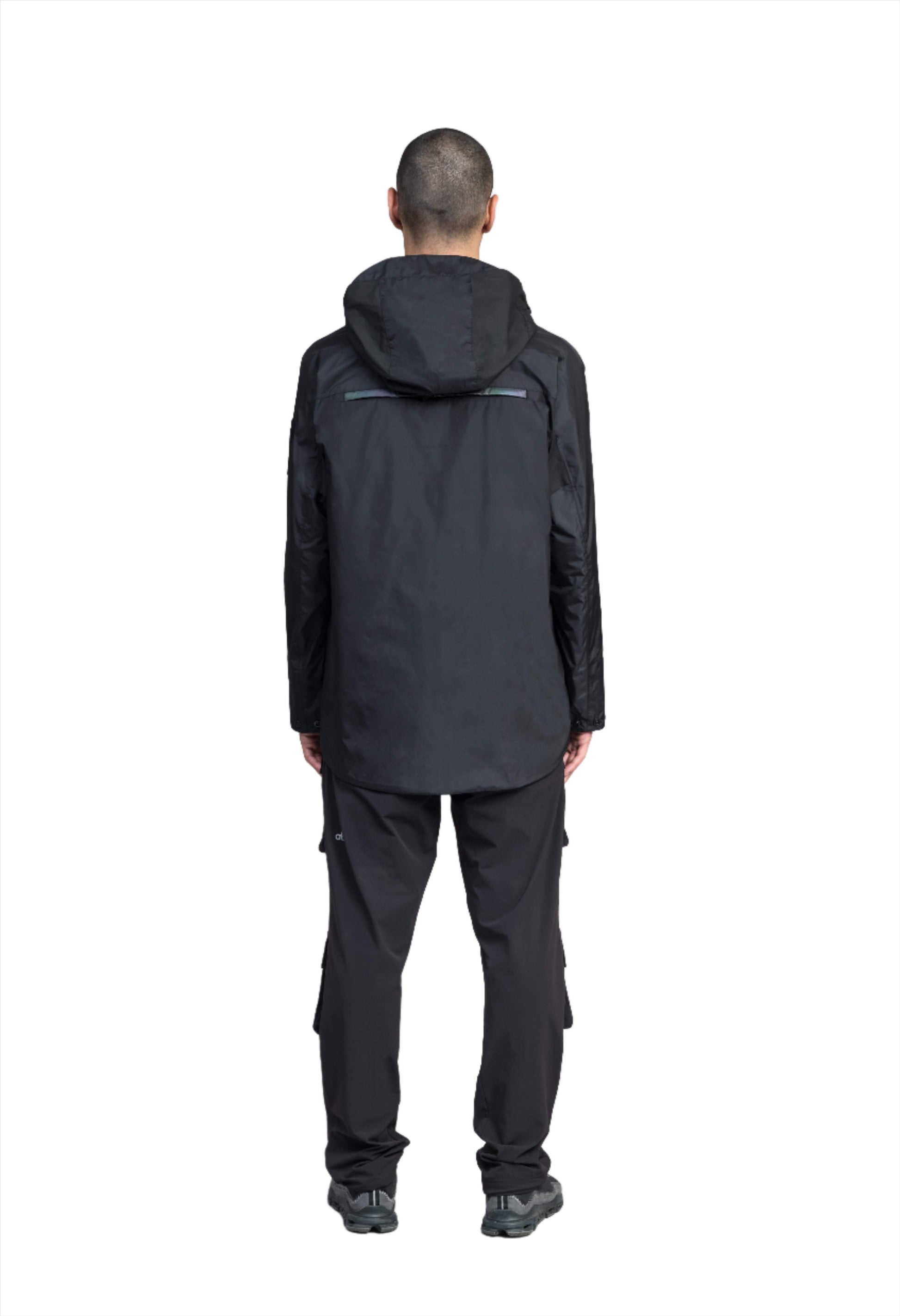 Mission Men's Performance Rain Shell Jacket in hip length, non-removable hood with adjustable toggle, two-way waterproof zipper, flap closure waist pockets with additional side entry storage, zipper ventilation on back, passive underarm ventilation, and breathable mesh lining, in Black