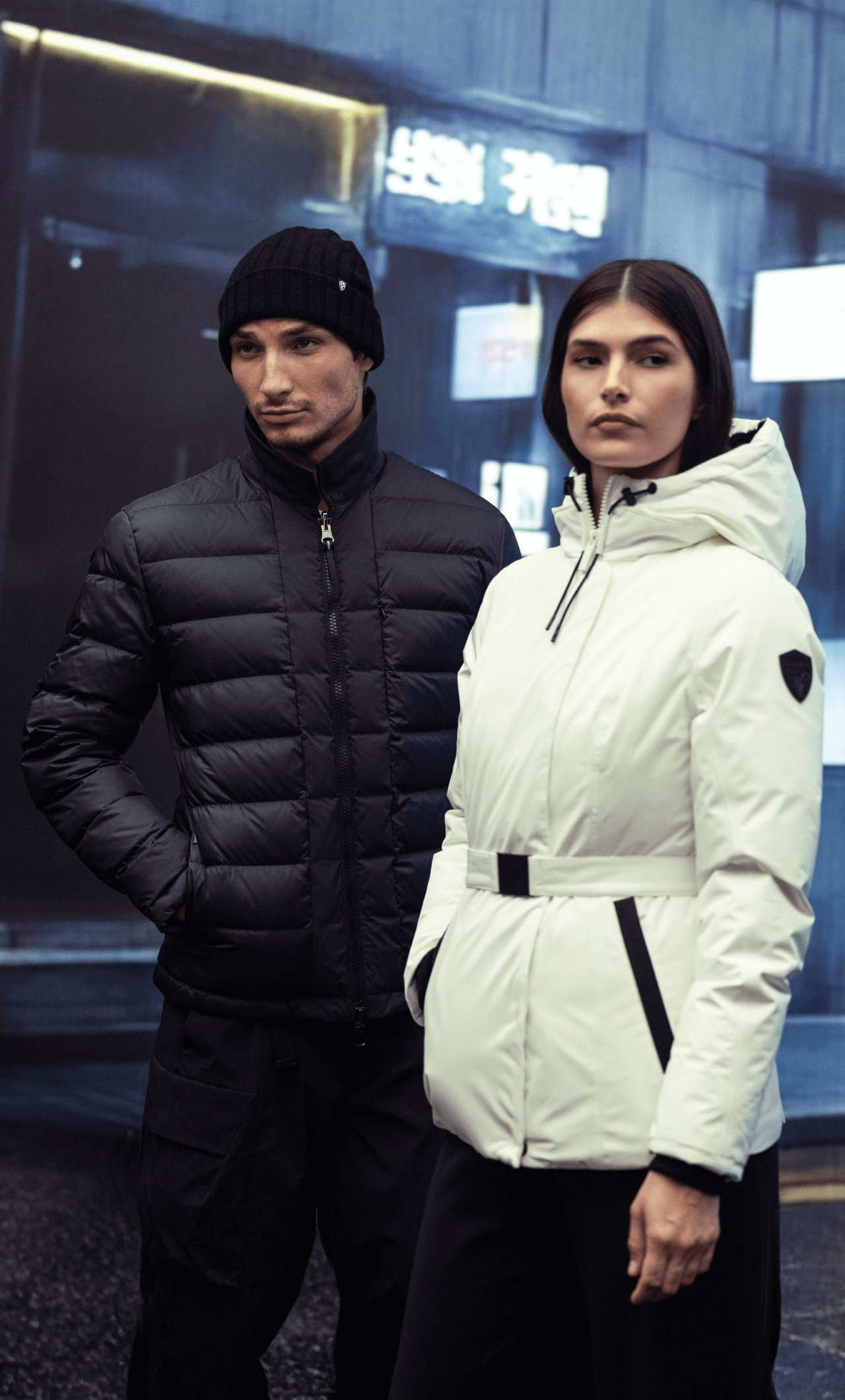 Man on left wearing Nobis Nicholas. Woman on right wearing Nobis Shaw.