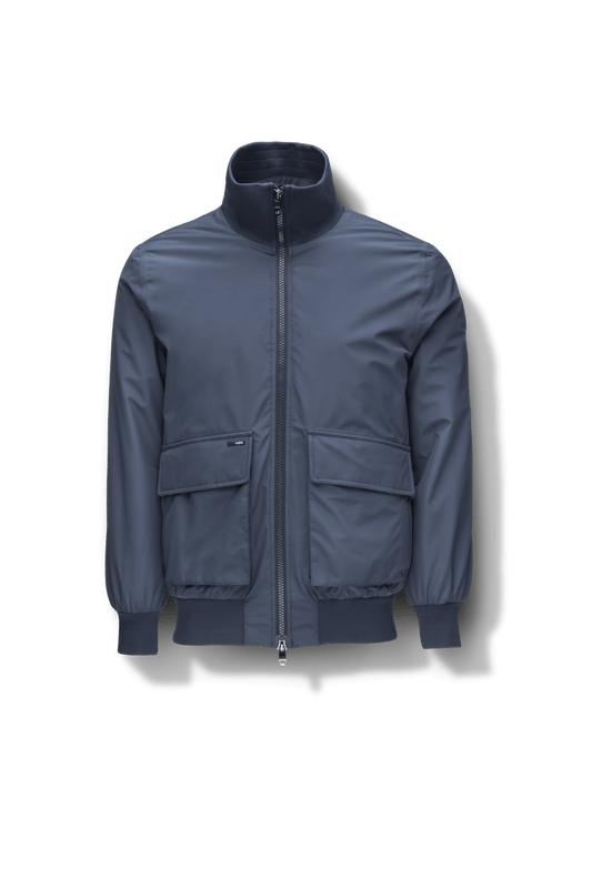 Flint Men's Tailored Rib Collar Jacket in hip length, premium 3-ply Micro Denier fabrication, premium 4-way stretch, water resistant Primaloft Gold Insulation Active +, flap pockets with magnetic closure at waist, side entry pockets at waist, ribbed sleeve cuffs, two-way branded zipper at centre front, box pleat detailing at centre back, large interior zipper pocket, and interior button pocket at left chest, in Marine + Marine