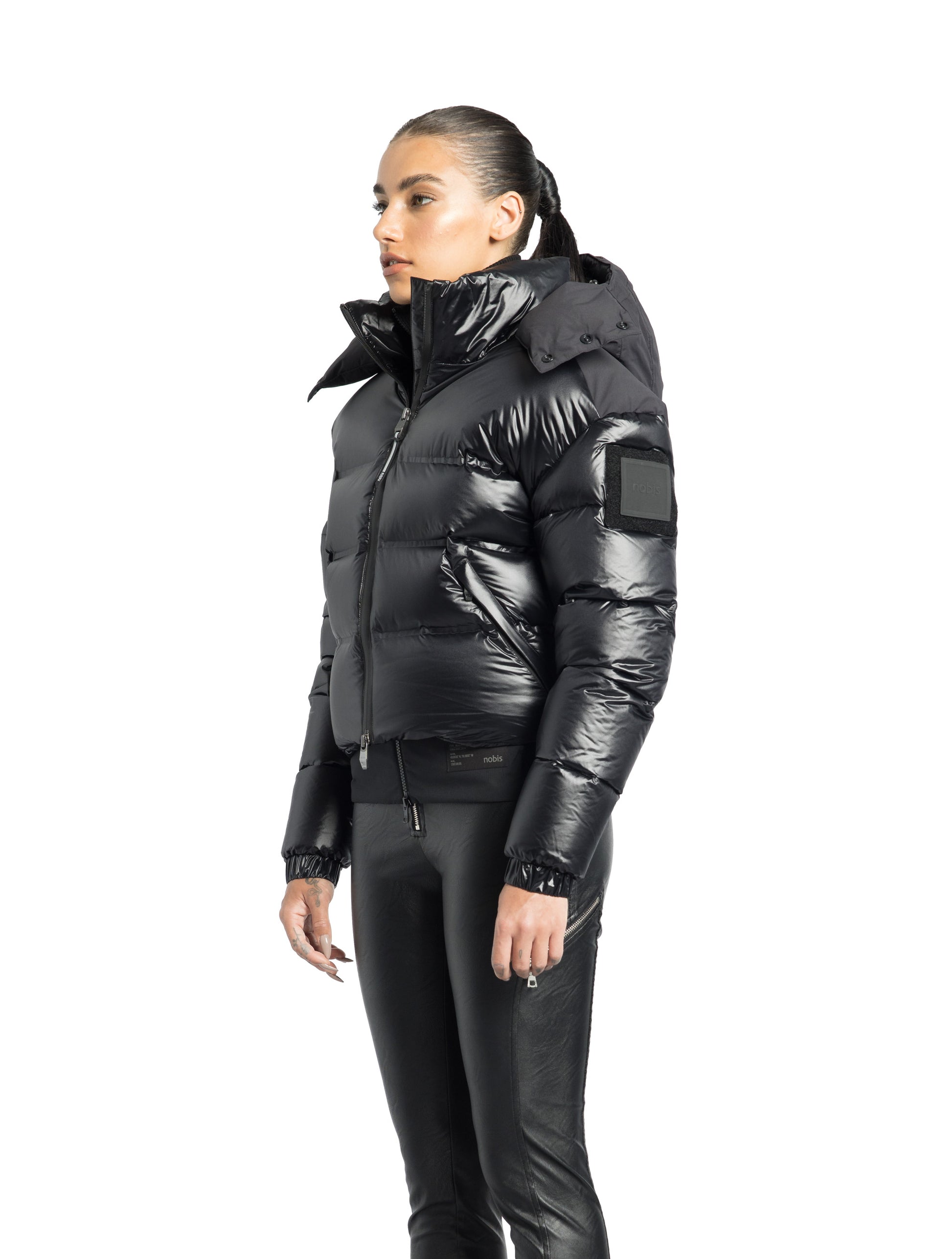 Tempus Women's Performance Short Puffer Jacket in waist length, premium technical nylon taffeta fabrication, Premium Canadian origin White Duck Down insulation, removable down-filled hood, two-way centre-front zipper, fleece-lined zipper pockets at waist, pit zipper vents, in Black