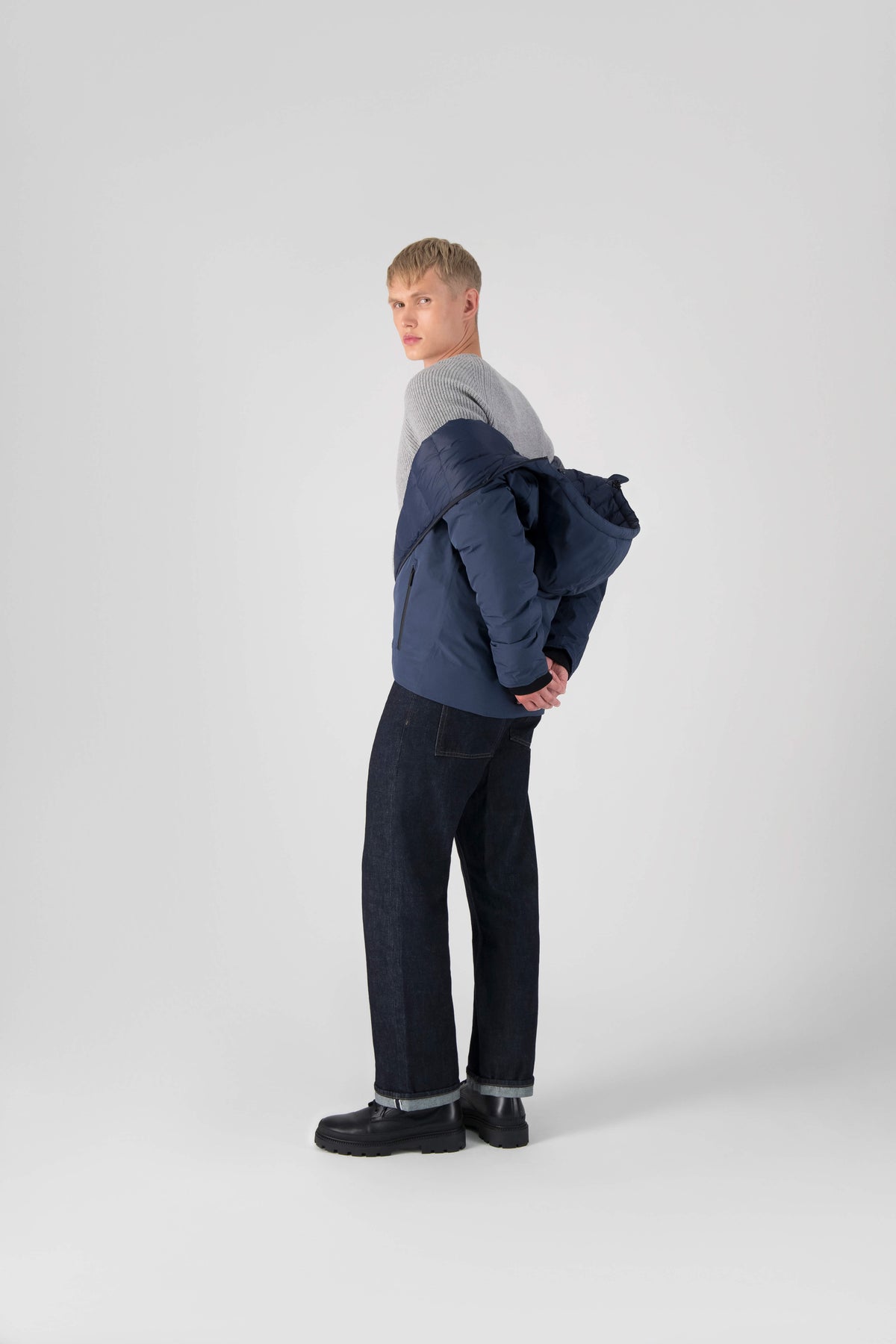 Hip length, reversible men's down filled jacket with removable hood in Marine