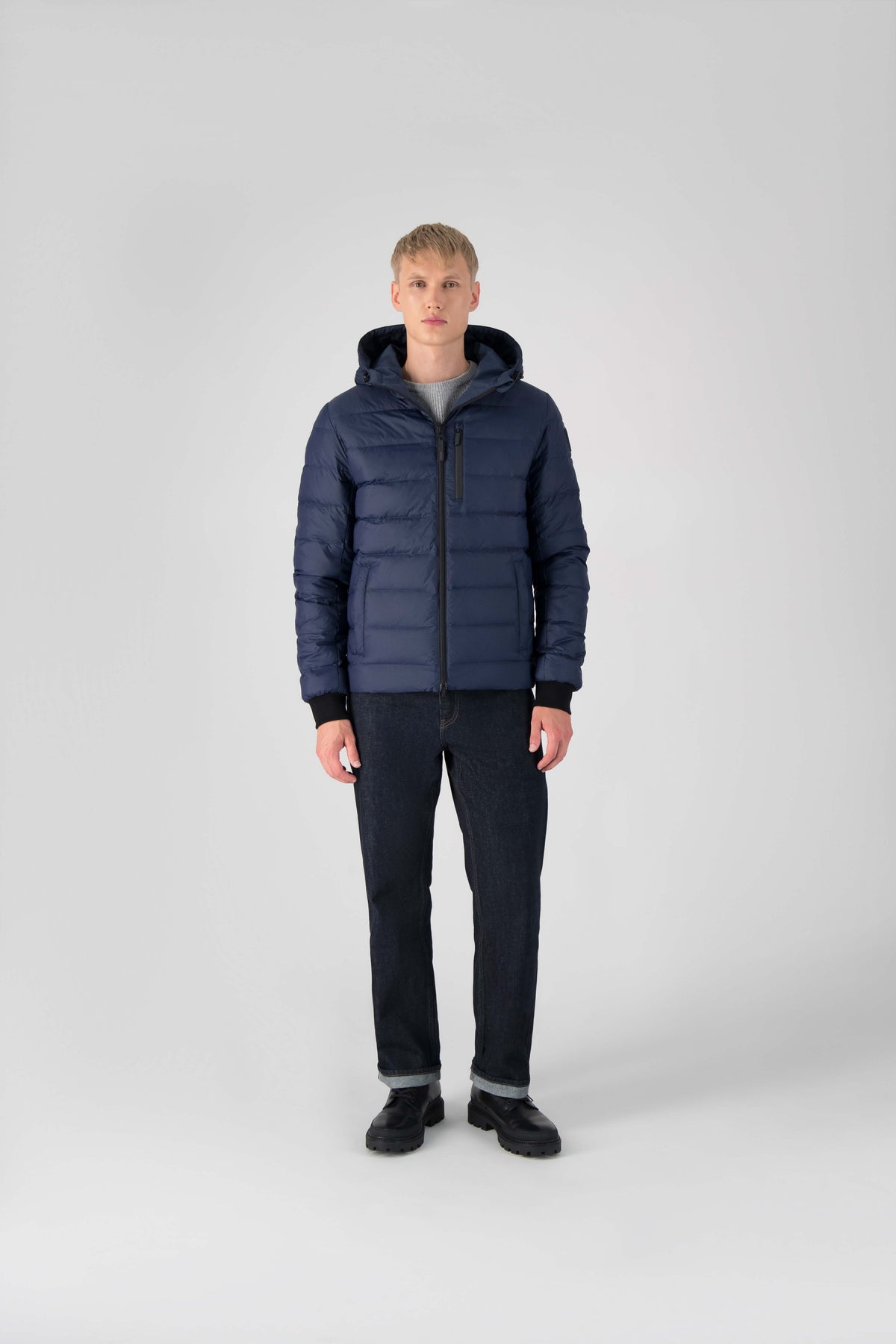 Hip length, reversible men's down filled jacket with removable hood in Marine