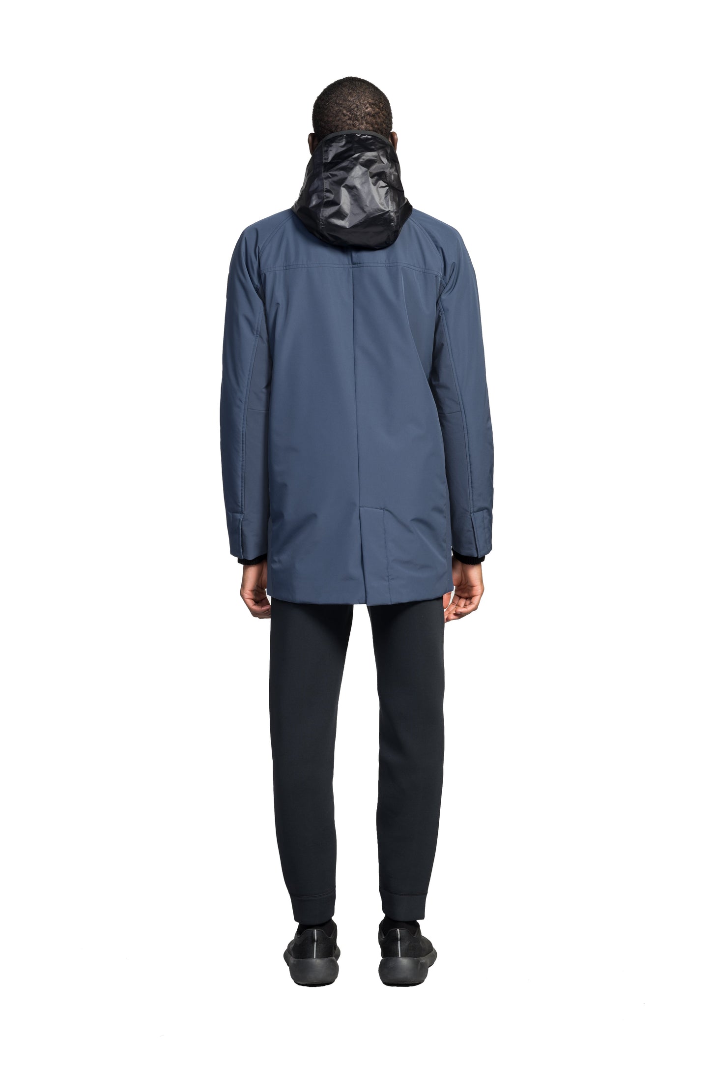 Pike Men's Tailored Mac Coat in thigh length, premium 3-ply Micro Denier fabrication at body and cire technical nylon taffeta fabrication at hood, premium 4-way stretch, water resistant Primaloft Gold Insulation Active+, hidden 2-way zipper with snap closure wind flap, single welt pockets with magnetic closure at waist, hidden snap placket at cuffs, pit zippers for ventilation, interior zipper pocket at right chest, and interior button pocket at left chest, in Marine