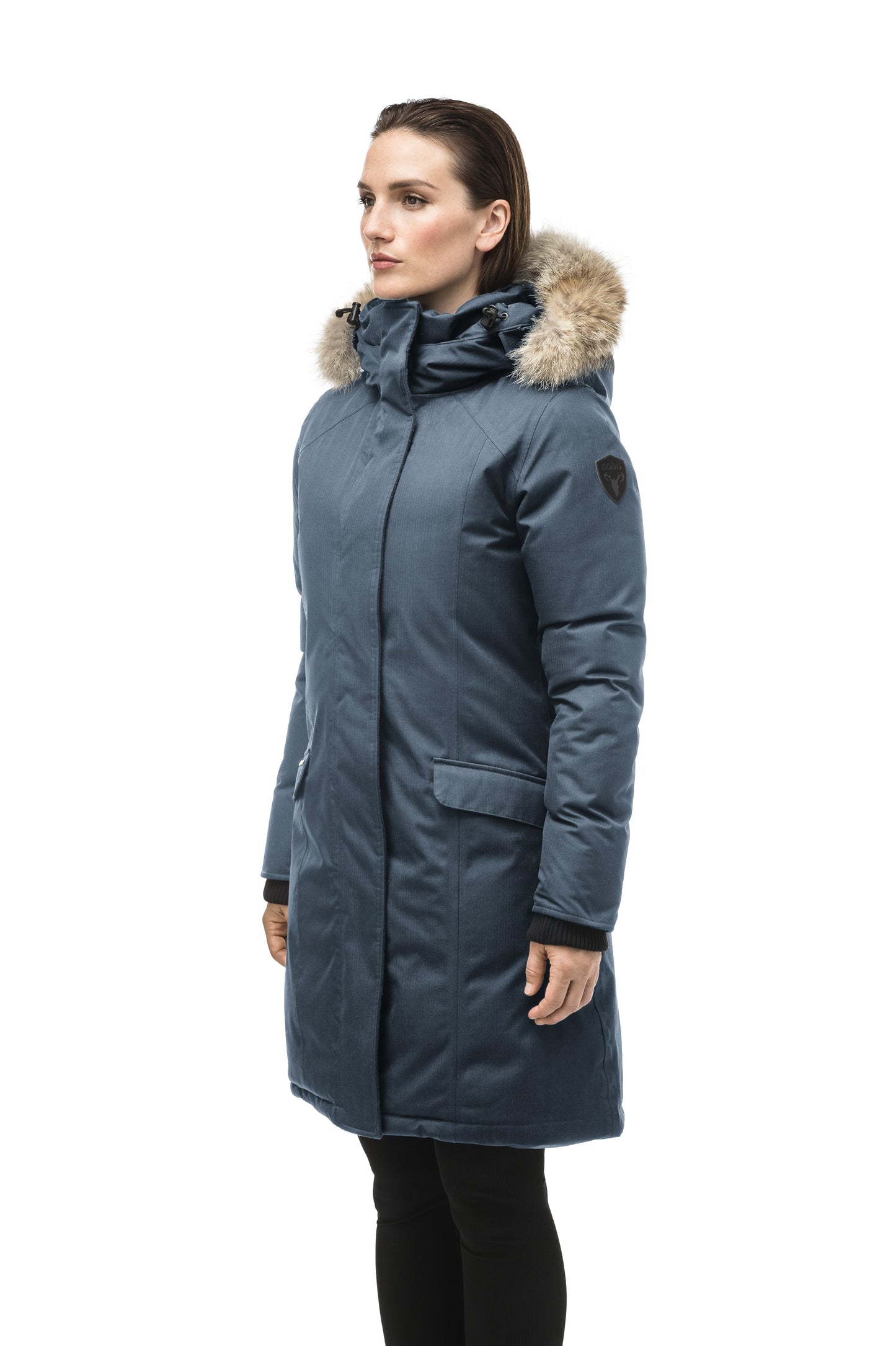 Rebecca Women's Parka in knee length, Canadian duck down insulation, two-way zipper with magnetic front placket, non-removable hood with removable coyote fur trim, in Balsam