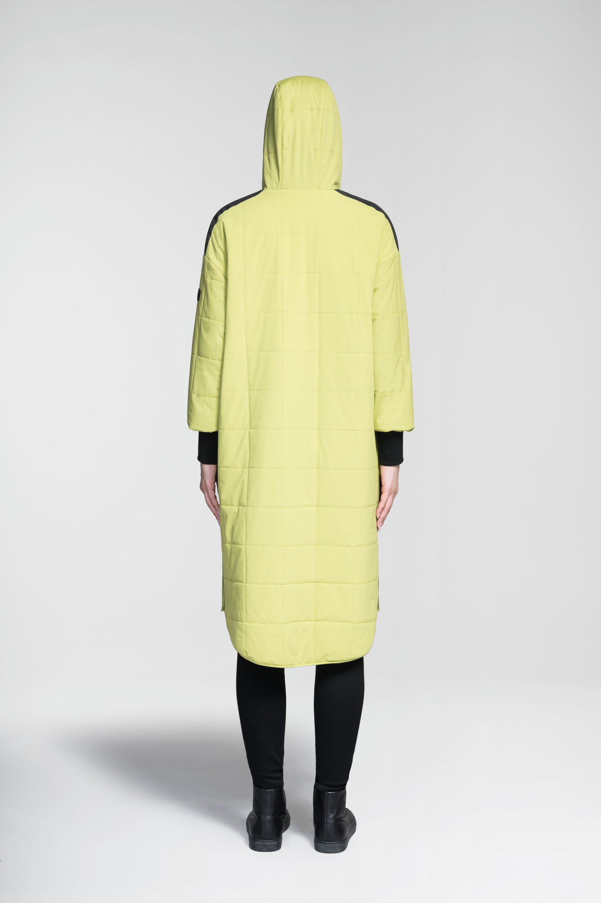 Radar Women's Performance Long Midlayer Jacket in long length, premium stretch ripstop and stretch Toray nylon fabrication, premium 4-way stretch, water resistant Primaloft Gold Insulation Active+, non-removable hood with adjustable draw cord, 2-way branded zipper at centre front, single welt pockets with magnetic closure at hips, elongated ribbed cuffs, grosgrain ribbon detail at shoulder and side seams, and snap closure side seam vent, in Dark Citron