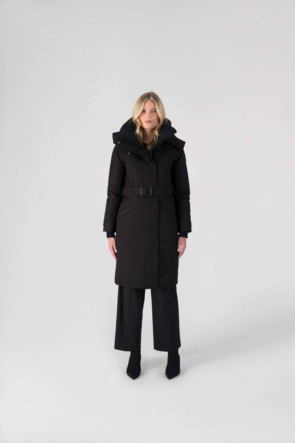She-Ra women's parka featuring a seam-sealed, waterproof, breathable shell, removable fur trim, magnetic closures, and an adjustable belted waist in Black