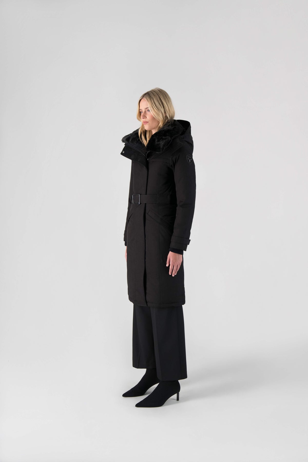 She-Ra women's parka featuring a seam-sealed, waterproof, breathable shell, removable fur trim, magnetic closures, and an adjustable belted waist in Black
