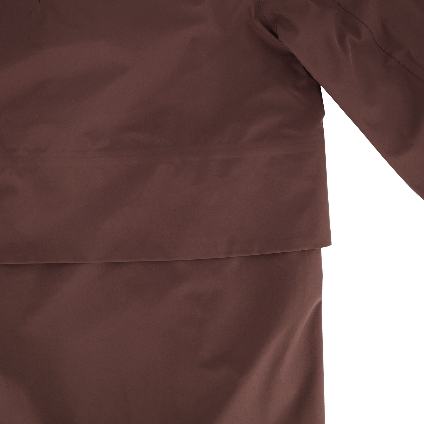 Upton long jacket in Coffee Bean in 3-ply Micro Denier fabric with DWR coating, featuring a two-way zipper with magnetic closure, hidden mesh ventilation, and underarm vents. Designed for weather protection and tailored comfort.