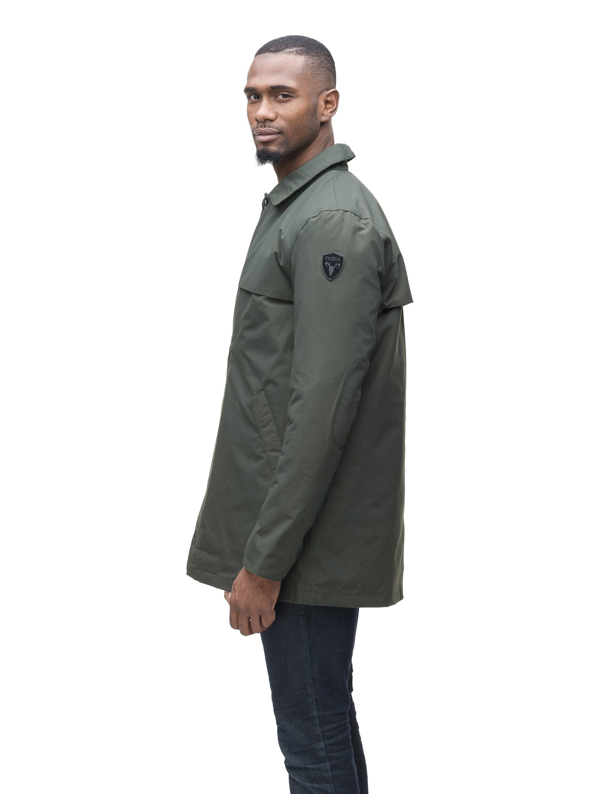 Men's waist length raincoat with a magnetic placket and top button detail in Dk Forest