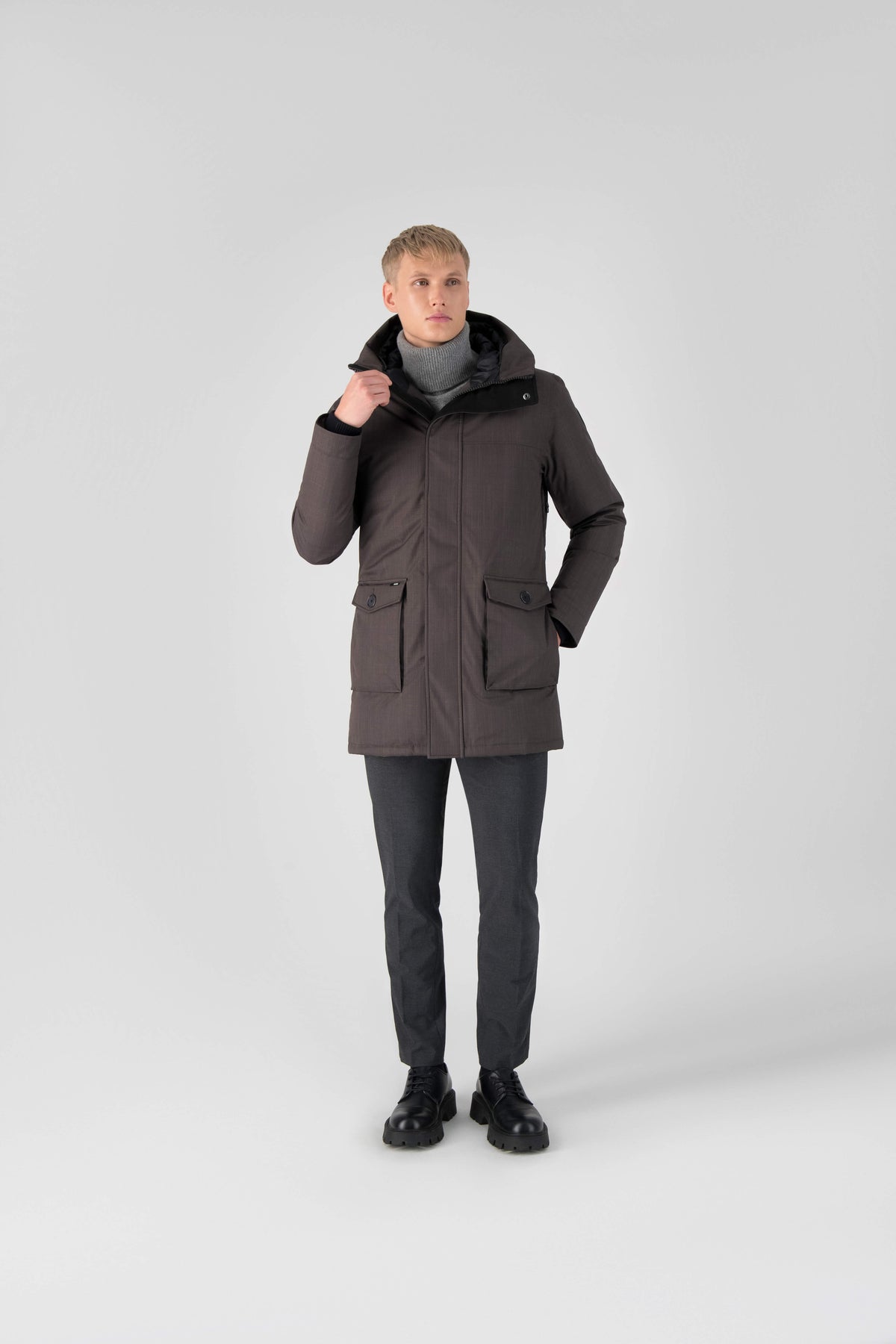 Men's slim fitting waist length parka with removable fur trim on the hood and two waist patch pockets in Steel Grey