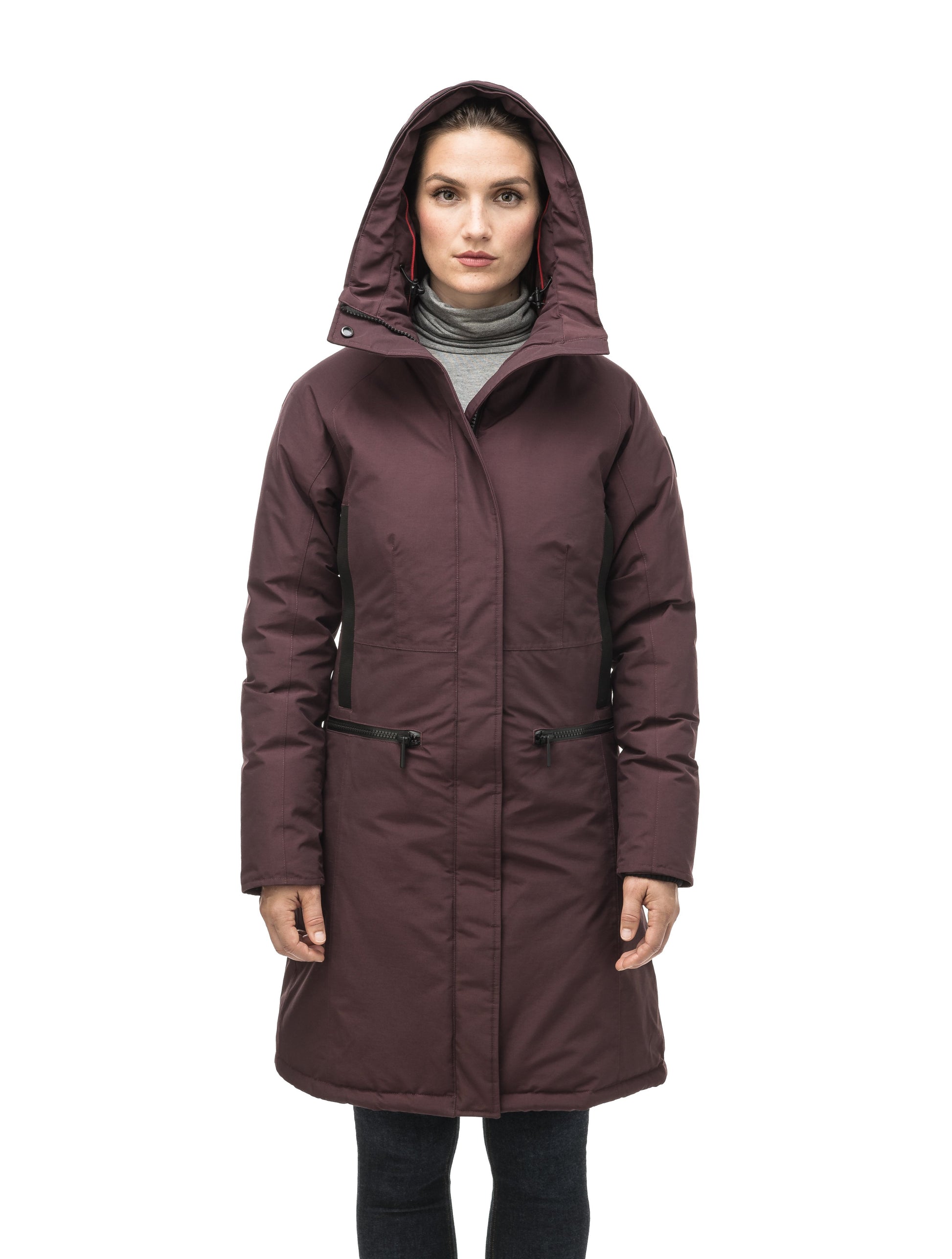 Knee length women's down filled parka with contrast ribbon accents and removable fur trim on the hood in Burgundy