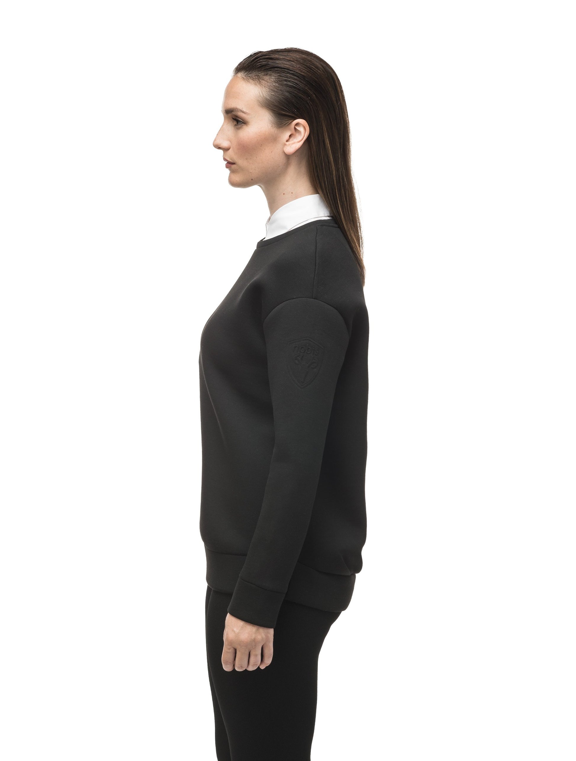 Classic black women's crew neck pullover with fold over hem detail in Black