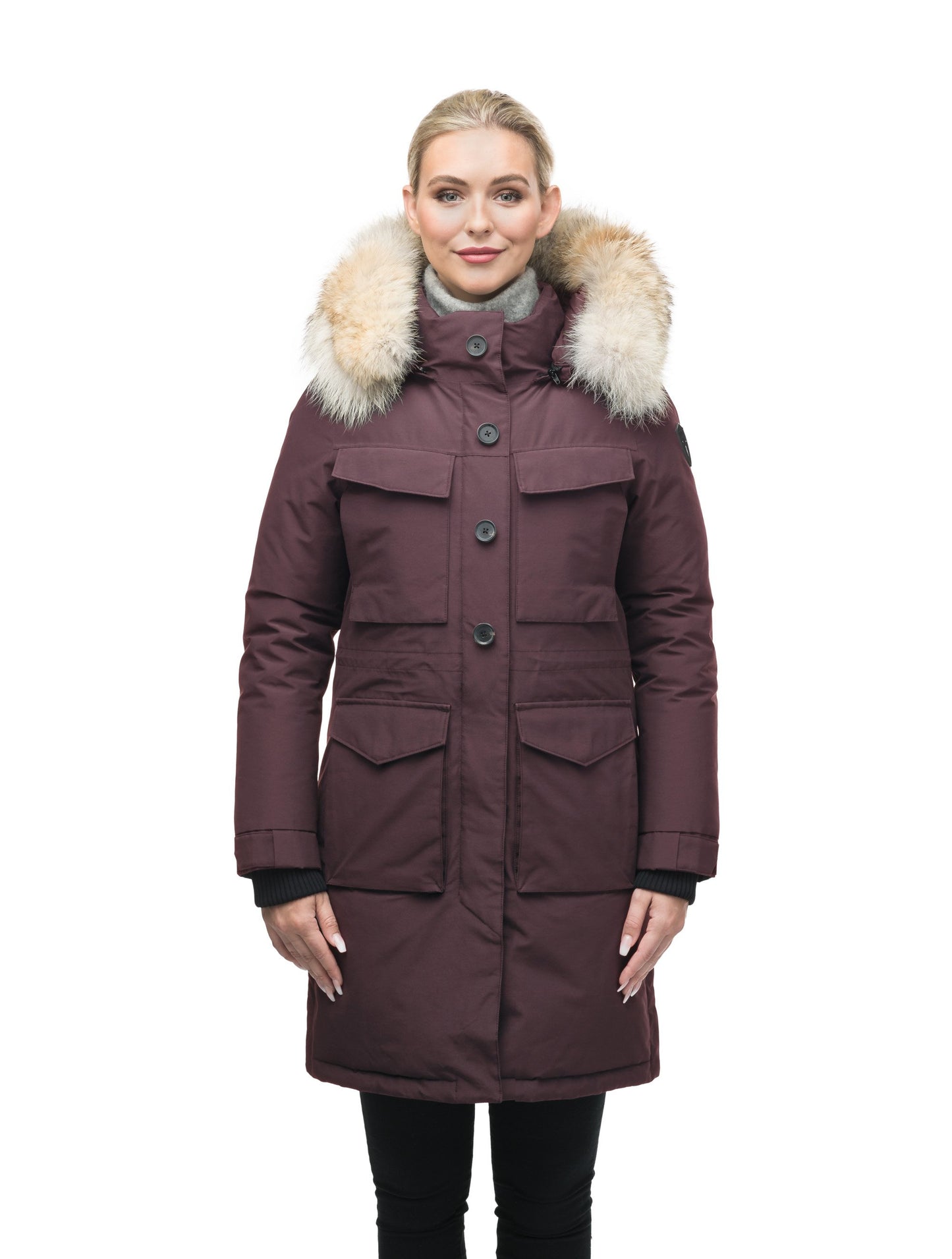 Women's knee length down filled parka with two chest patch pockets and two waist patch pockets in Burgundy