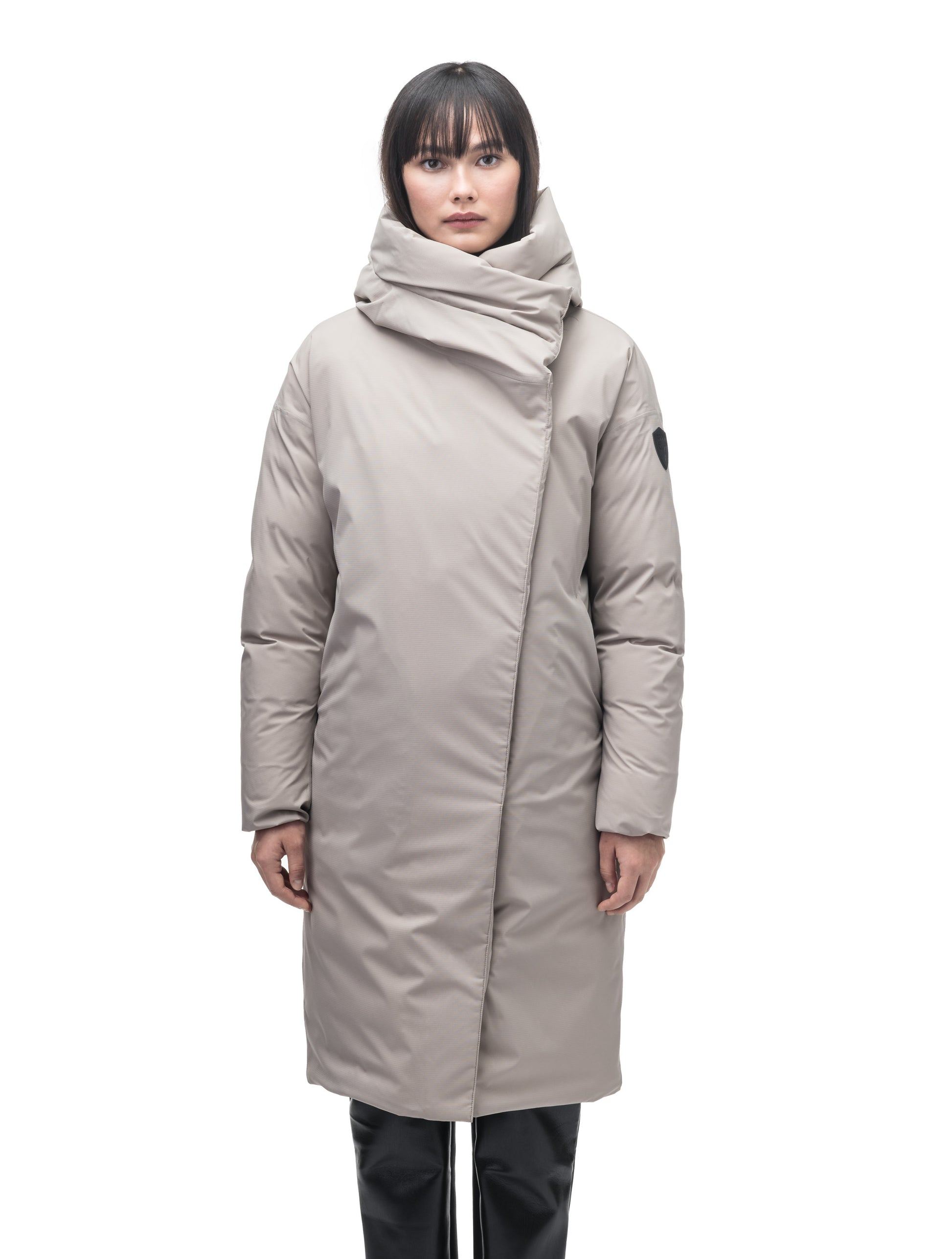 Axis Ladies Oversized Coat in knee length, Canadian duck down insulation, and two-way front zipper, in Clay