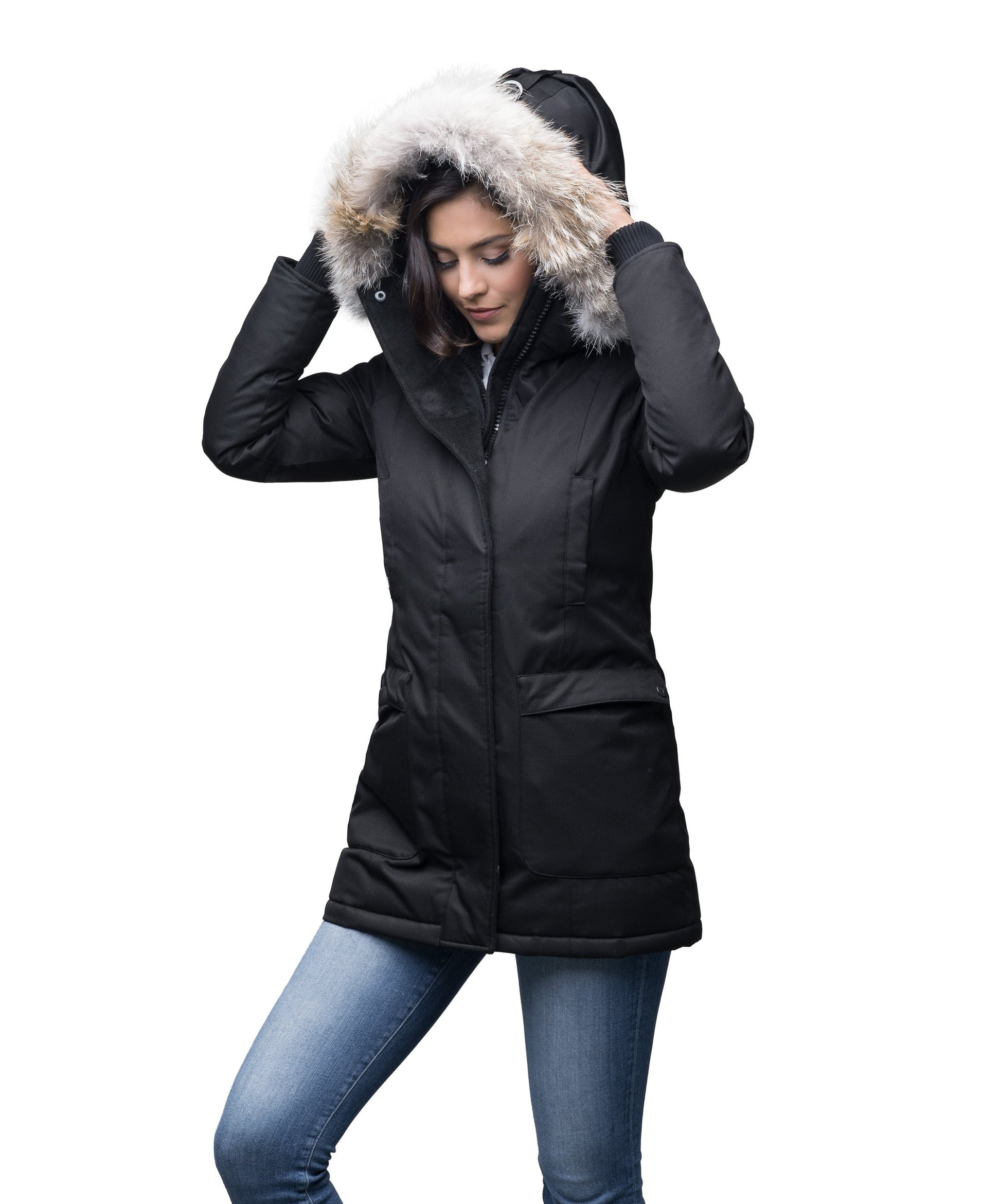 Women's down filled parka that sits just below the hip with a clean look and two hip patch pockets in CH Black