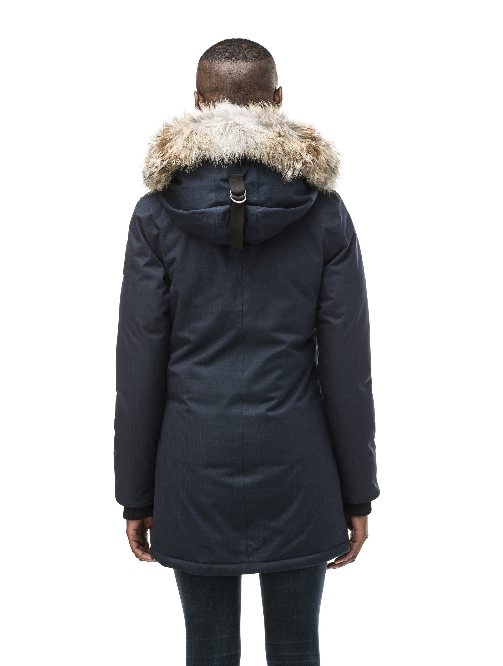 Women's down filled parka that sits just below the hip with a clean look and two hip patch pockets in CH Navy