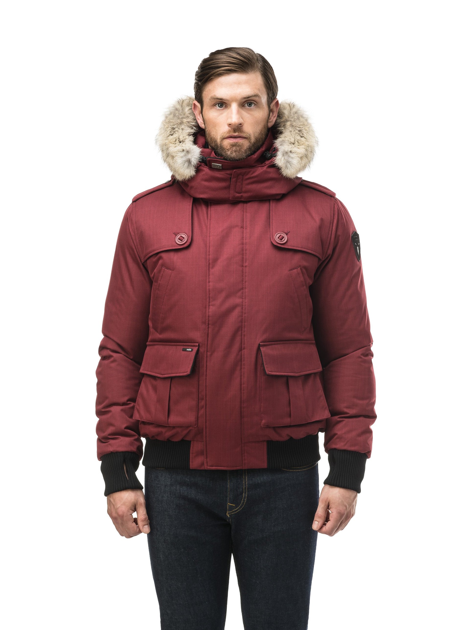 Men's down filled bomber that sits just above the hips with a completely removable hood that's windproof, waterproof, and breathable in CH Cabernet