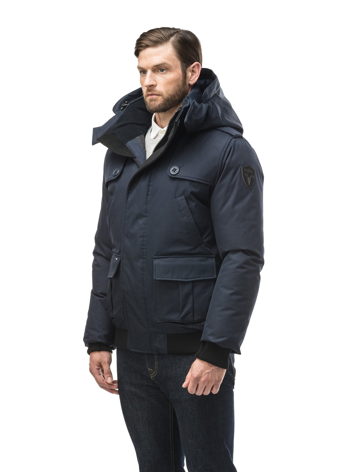 Men's down filled bomber that sits just above the hips with a completely removable hood that's windproof, waterproof, and breathable in CH Navy