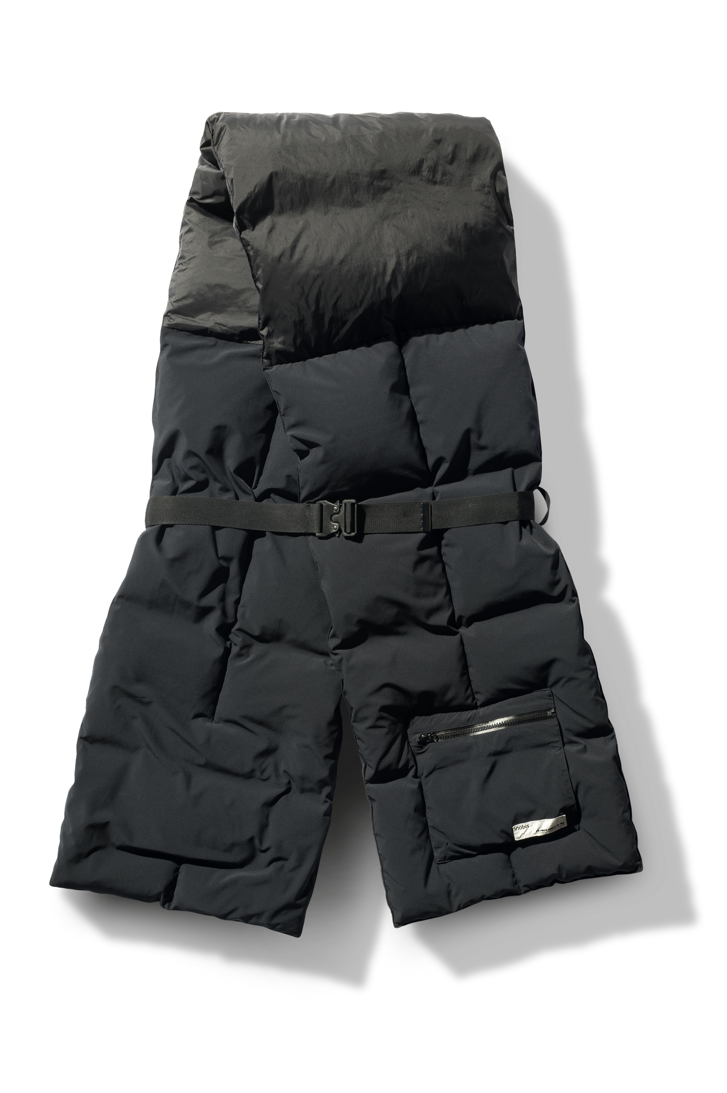 Chroma Unisex Oversized Puffer Scarf in stretch ripstop and taffeta nylon in a quilted pattern, Canadian White Duck Down insulation, cobra buckle belt with webbing strap, and large zipper pocket at scarf end, in Black