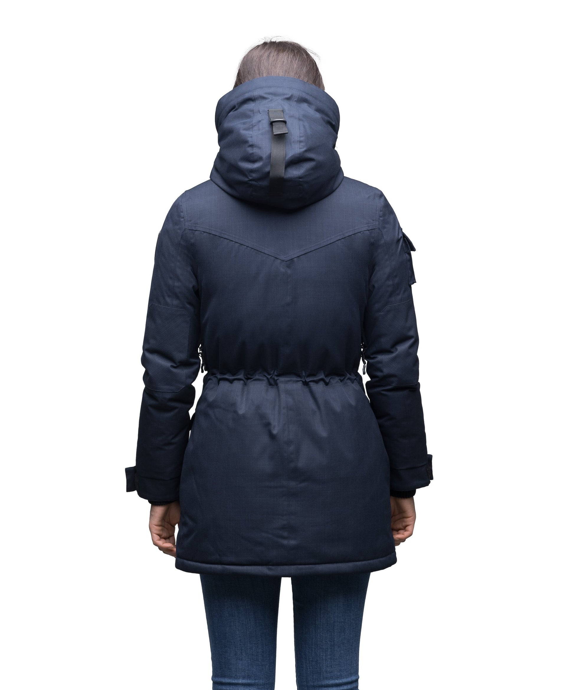 Women's down filled thigh length parka with four pleated patch pockets and an adjustable waist in CH Navy