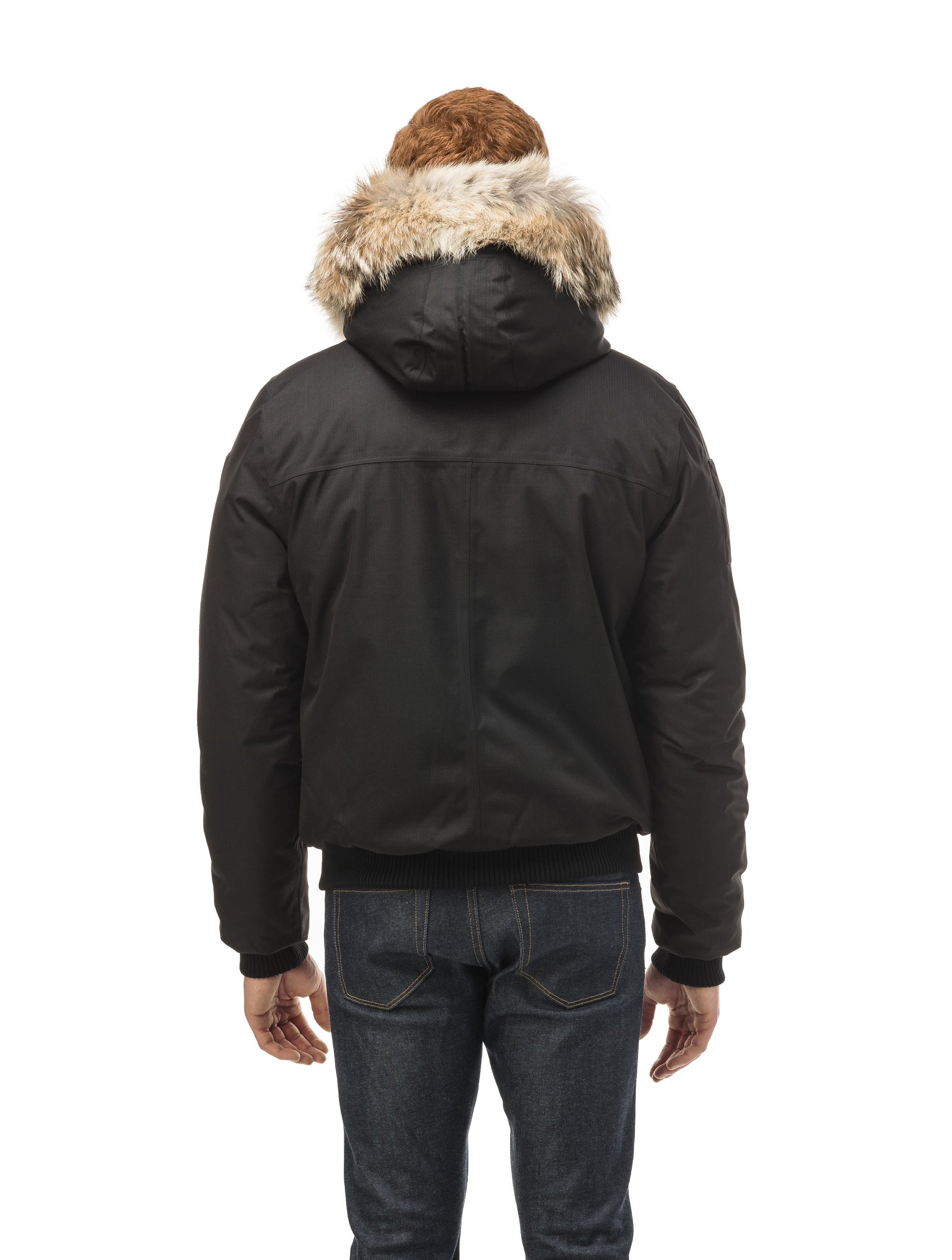 Men's classic down filled bomber jacket with a down filledÃƒâ€šÃ‚Â hood that features a removable coyote fur trim and concealed moldable framing wire in Black