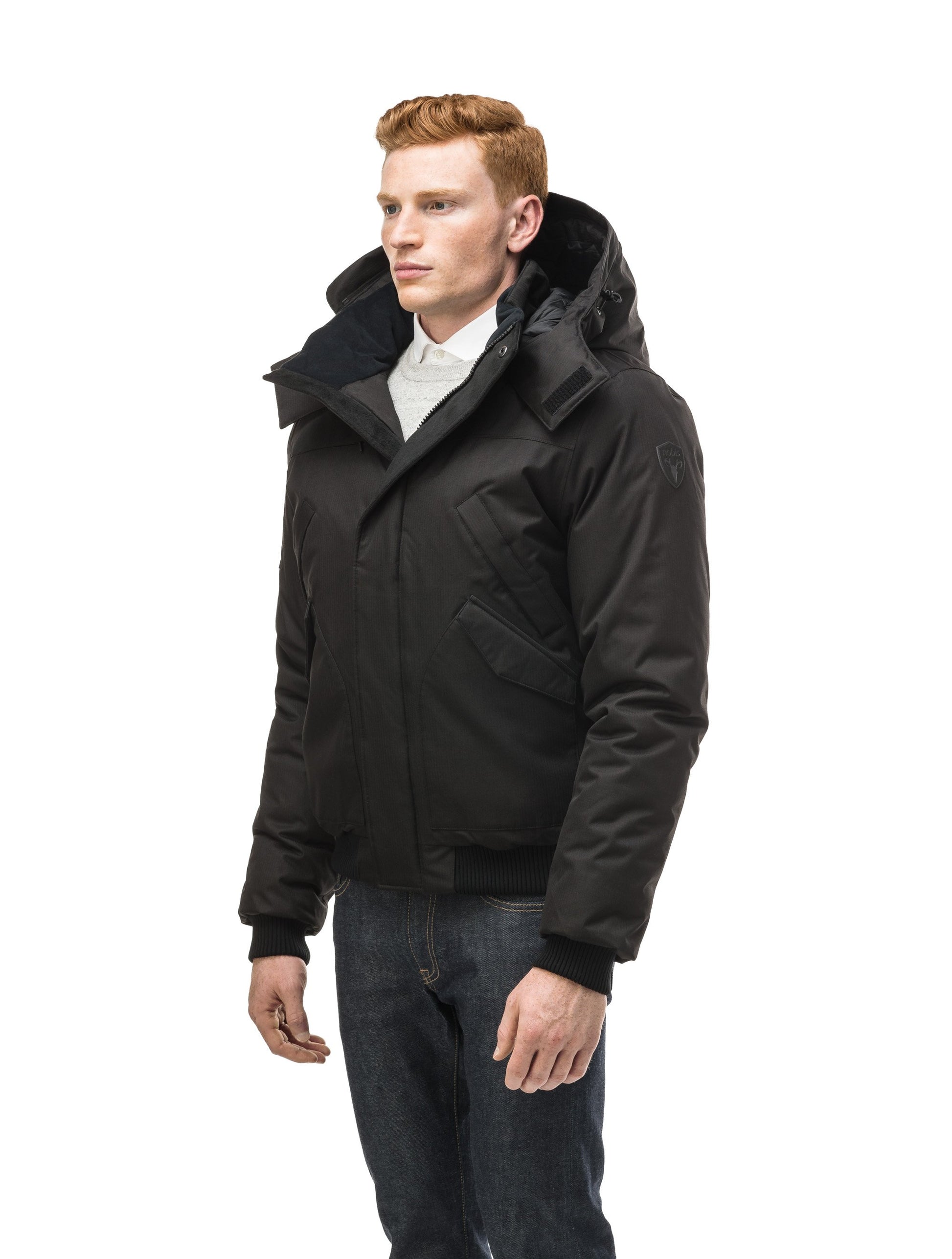 Men's classic down filled bomber jacket with a down filledÃƒâ€šÃ‚Â hood that features a removable coyote fur trim and concealed moldable framing wire in Black