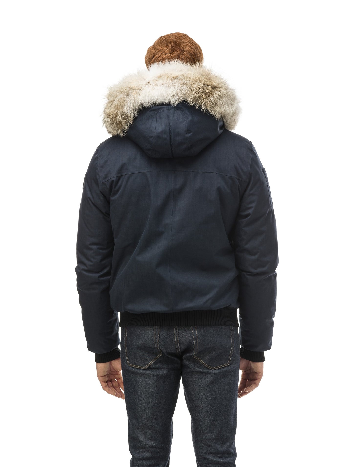 Men's classic down filled bomber jacket with a down filledÃƒâ€šÃ‚Â hood that features a removable coyote fur trim and concealed moldable framing wire in Navy