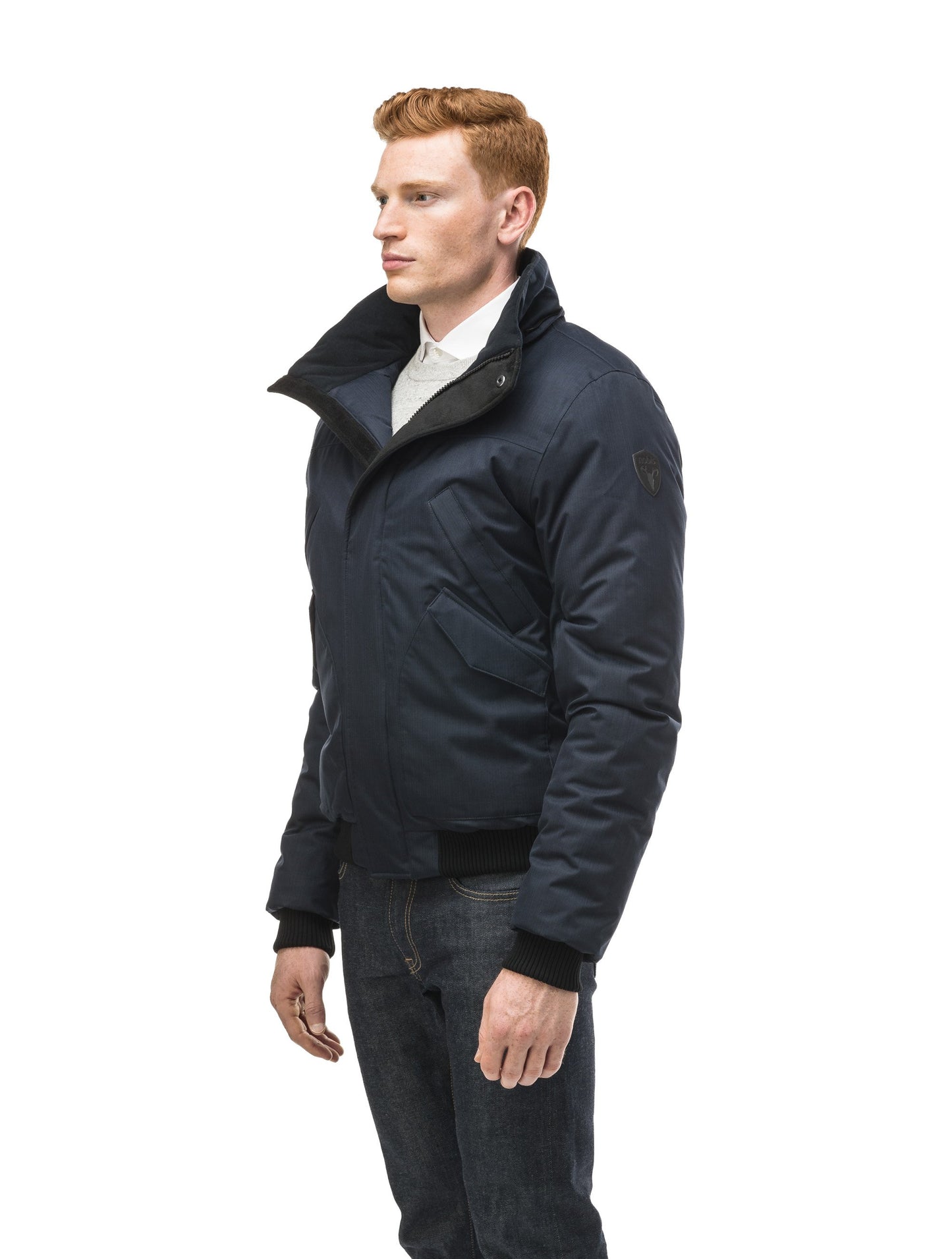 Men's classic down filled bomber jacket with a down filledÃƒâ€šÃ‚Â hood that features a removable coyote fur trim and concealed moldable framing wire in Navy