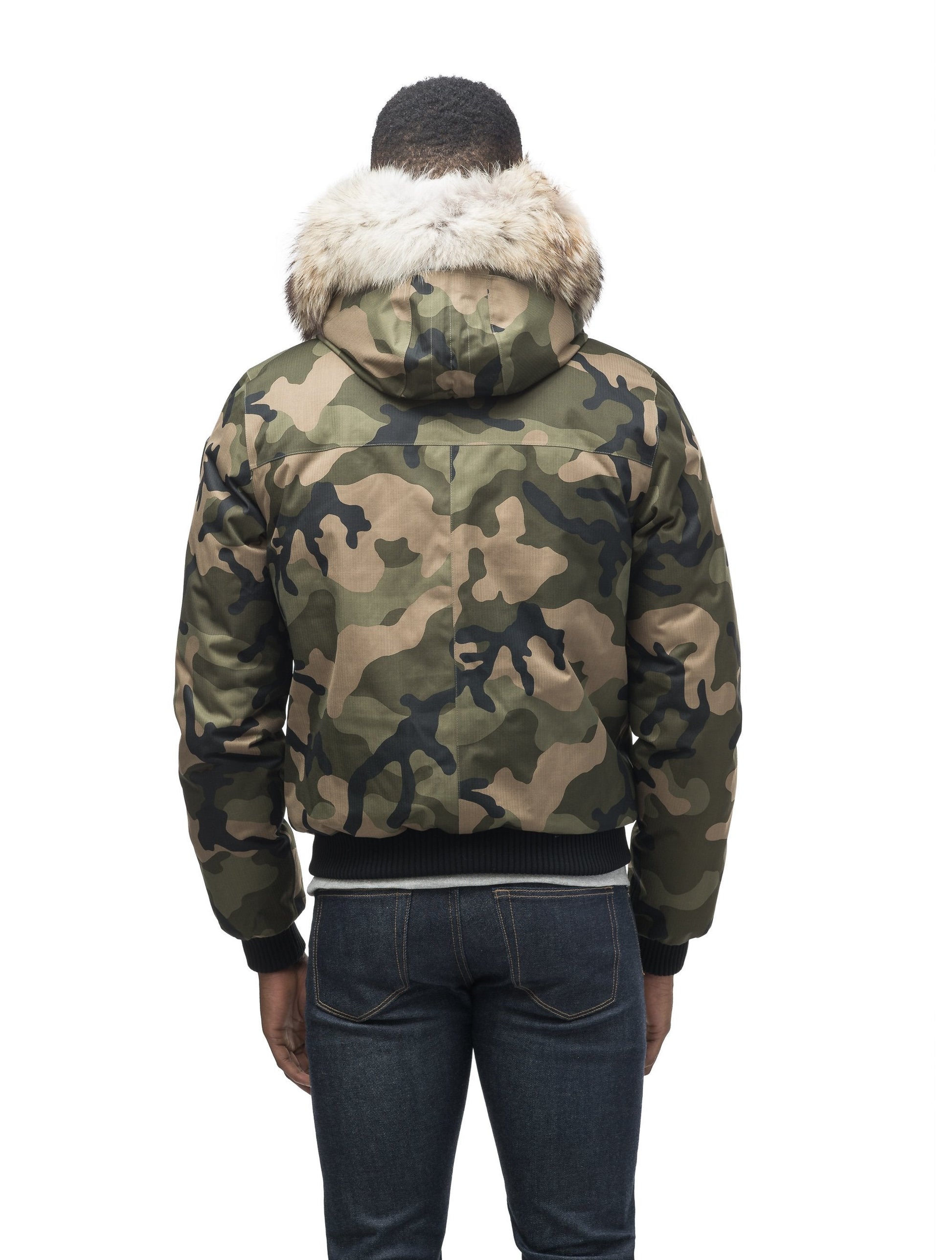 Men's classic down filled bomber jacket with a down filledÃ‚Â hood that features a removable coyote fur trim and concealed moldable framing wire in Camo