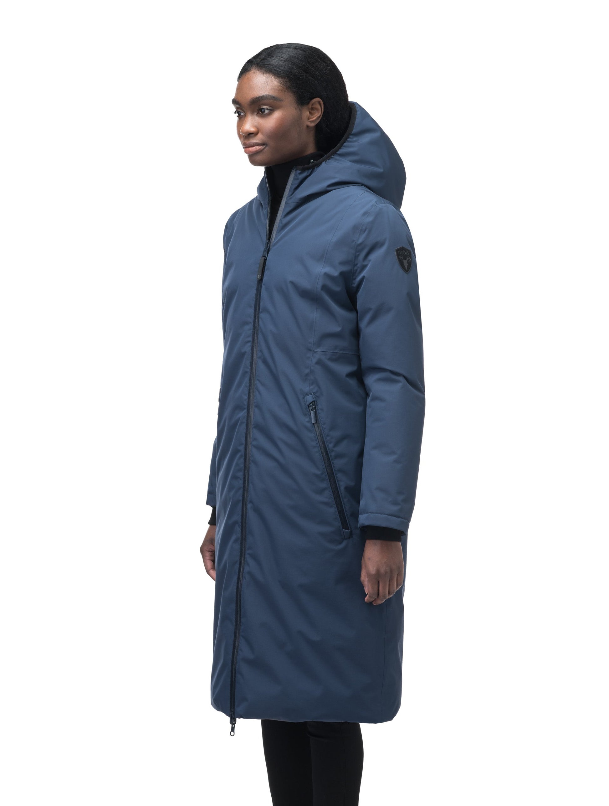 Ladies knee length reversible down-filled parka with non-removable hood in Marine