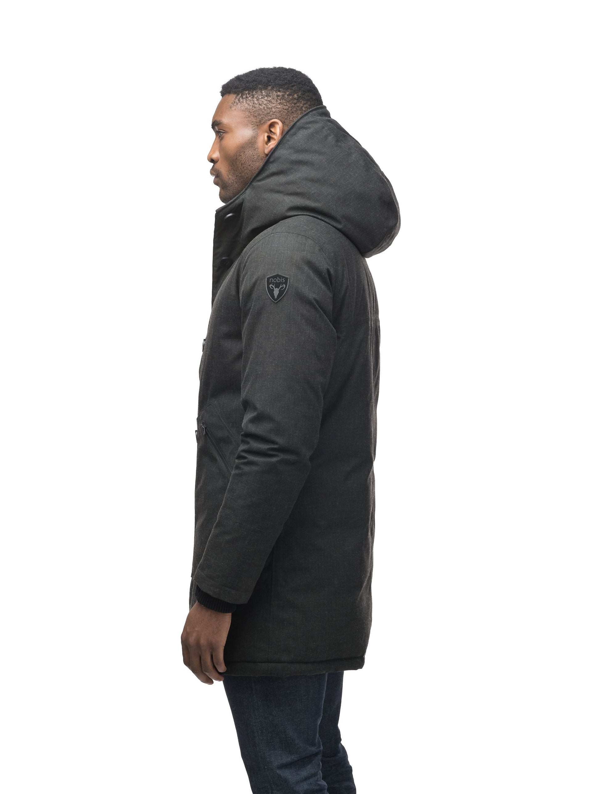 Men's fur free hooded parka with zipper and button closure placket featuring two oversized front pockets in H. Black